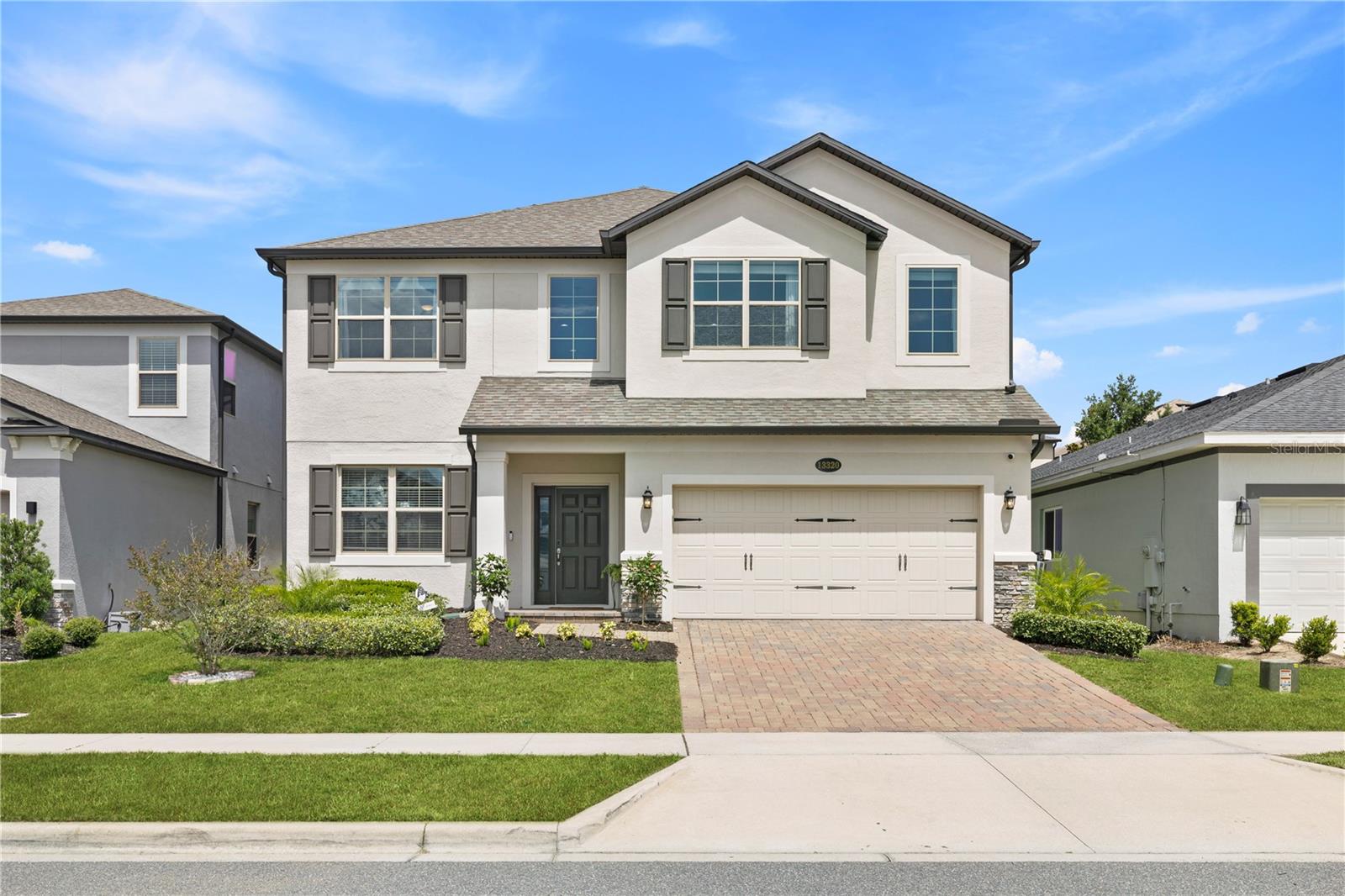 Welcome to an exceptional opportunity in one of Clermont's desirable communities! This stunning residence offers the ideal blend of luxury, comfort and modern Florida living. Built in 2019 and meticulously maintained, this impressive home features five spacious bedrooms, four full baths and over 3,500 square feet of thoughtfully designed living space. From the moment you enter, you'll be captivated by the open-concept floor plan, soaring ceilings, abundant natural light and elegant finishes throughout. The gourmet kitchen is a chef's dream, showcasing beautiful cabinetry, premium countertops, stainless steel appliances, a large center island and ample storage, ideal for entertaining family and friends. The expansive living and dining areas seamlessly connect to create an inviting atmosphere for everyday living and special gatherings alike.