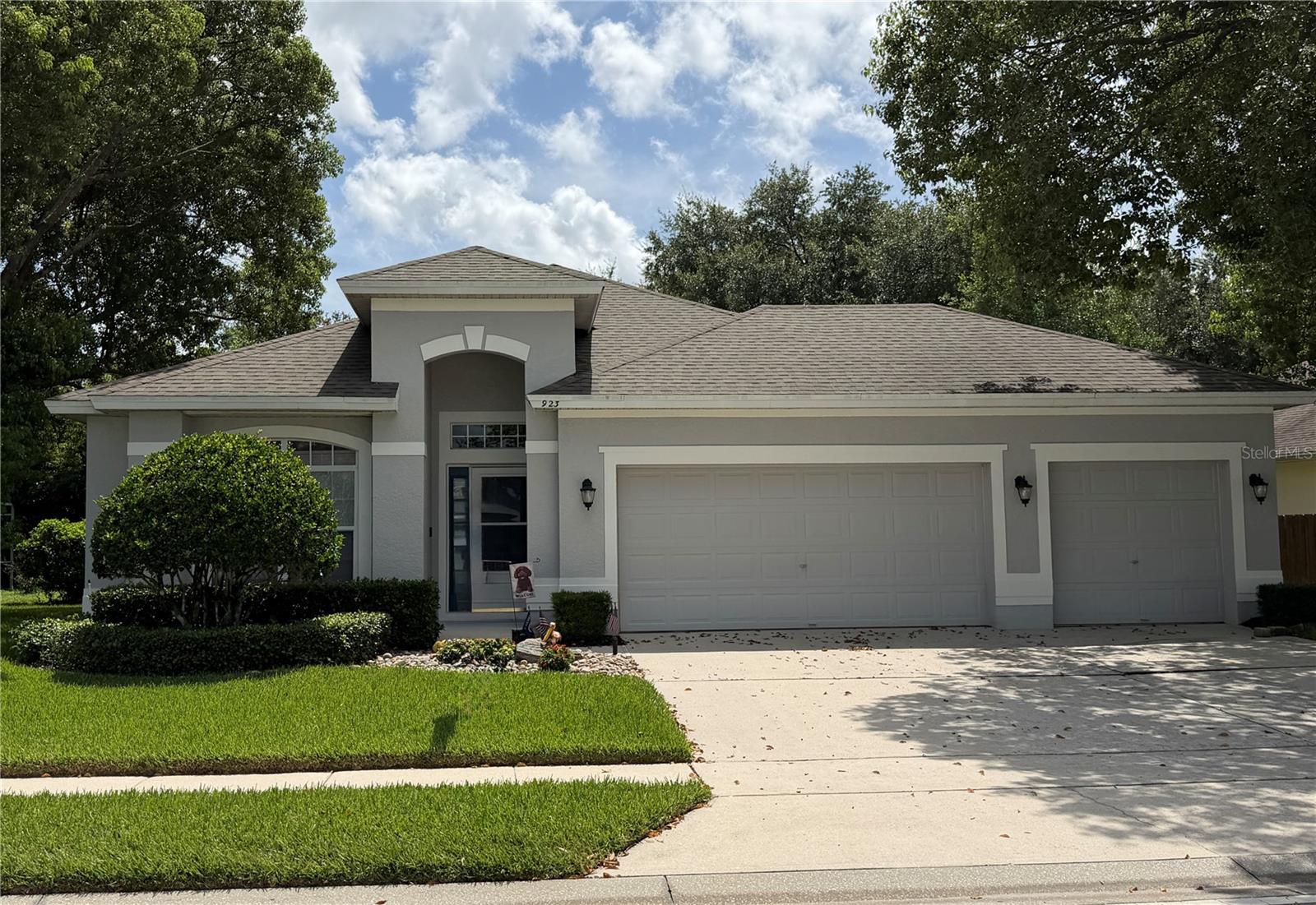 Come and see this gorgeous 4/2, 3 car garage home located in beautiful East Orlando community of Bridge Water. This home has luxury laminate floors throughout, a split floorplan, remodeled primary bathroom, and a big screened/covered porch great for entertainment. New carpet in all bedrooms, crown moldings and more. The Bridge Water community has a clubhouse that can be rented out for activities, two well maintained pools, a gym, playground, and beautiful common areas. Bridge Water is well located close to major highways, restaurants, shopping and minutes from UCF. Don't wait, make an appointment to see this home today! All information recorded in the MLS is intended to be accurate but cannot be guaranteed, buyers are advised to verify.