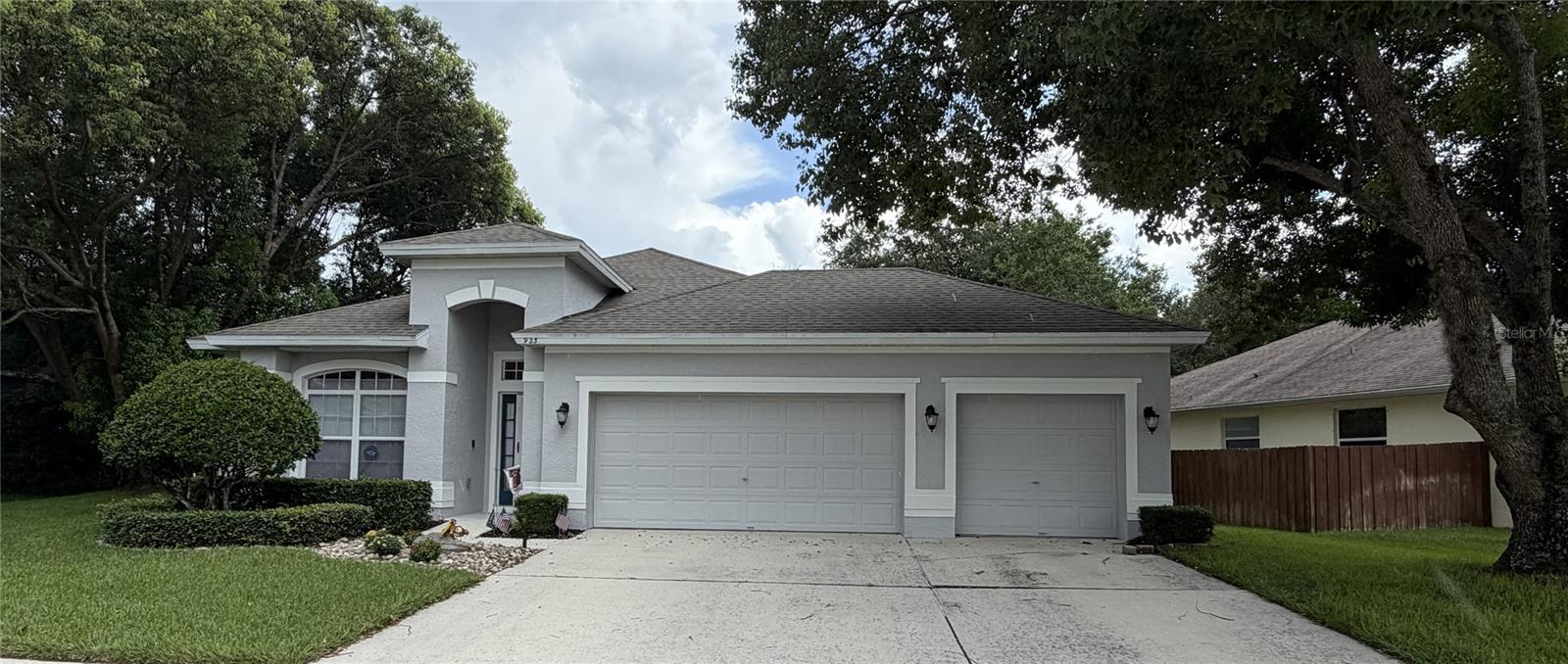 Come and see this gorgeous 4/2, 3 car garage home located in beautiful East Orlando community of Bridge Water. This home has luxury laminate floors throughout, a split floorplan, remodeled primary bathroom, and a big screened/covered porch great for entertainment. New carpet in all bedrooms, crown moldings and more. The Bridge Water community has a clubhouse that can be rented out for activities, two well maintained pools, a gym, playground, and beautiful common areas. Bridge Water is well located close to major highways, restaurants, shopping and minutes from UCF. Don't wait, make an appointment to see this home today! All information recorded in the MLS is intended to be accurate but cannot be guaranteed, buyers are advised to verify.