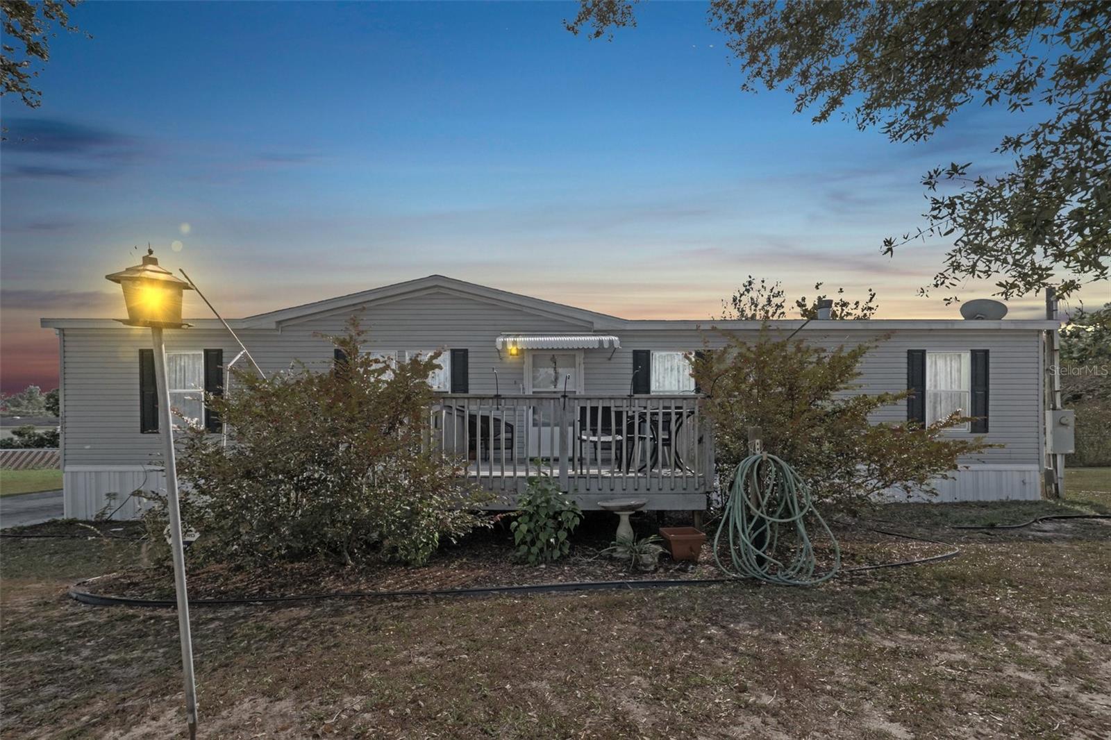Welcome to this charming 3-bedroom, 2-bathroom mobile home, perfectly situated on a substantial .34 acre lot. This inviting residence spans a generous 1,512 square feet, offering plenty of room for comfort, relaxation, and entertaining.
Upon entry, you are welcomed into a cozy living room that seamlessly flows into a family room. The family room features an electric fireplace, creating a warm and inviting atmosphere during those cooler evenings. Throughout the home, you'll find durable vinyl flooring and elegant tile for easy maintenance. The bedrooms are carpeted, providing a soft and comfortable retreat at the end of the day.
The primary bathroom is thoughtfully designed with a dual vanity, ensuring ample space for your daily routines. Outdoor living is a breeze with an enclosed back patio - perfect for alfresco dining or sipping your morning coffee. Additional decks on both the front and back of the house allow you to fully enjoy the serenity of your surroundings.
Location is everything, and this home does not disappoint. Situated just 1.4 miles from groceries, 1.5 miles from a gym and medical facilities, and 1.6 miles from a grocery store, all your essential amenities are within easy reach. If dining out is on your agenda, you'll be spoilt for choice with 30 restaurants within a 5-mile radius. For recreation, you have access to 15 golf courses and a park within a 10-mile range.
This mobile home offers a unique blend of comfort, convenience, and lifestyle. Don't miss the opportunity to call this your new home!