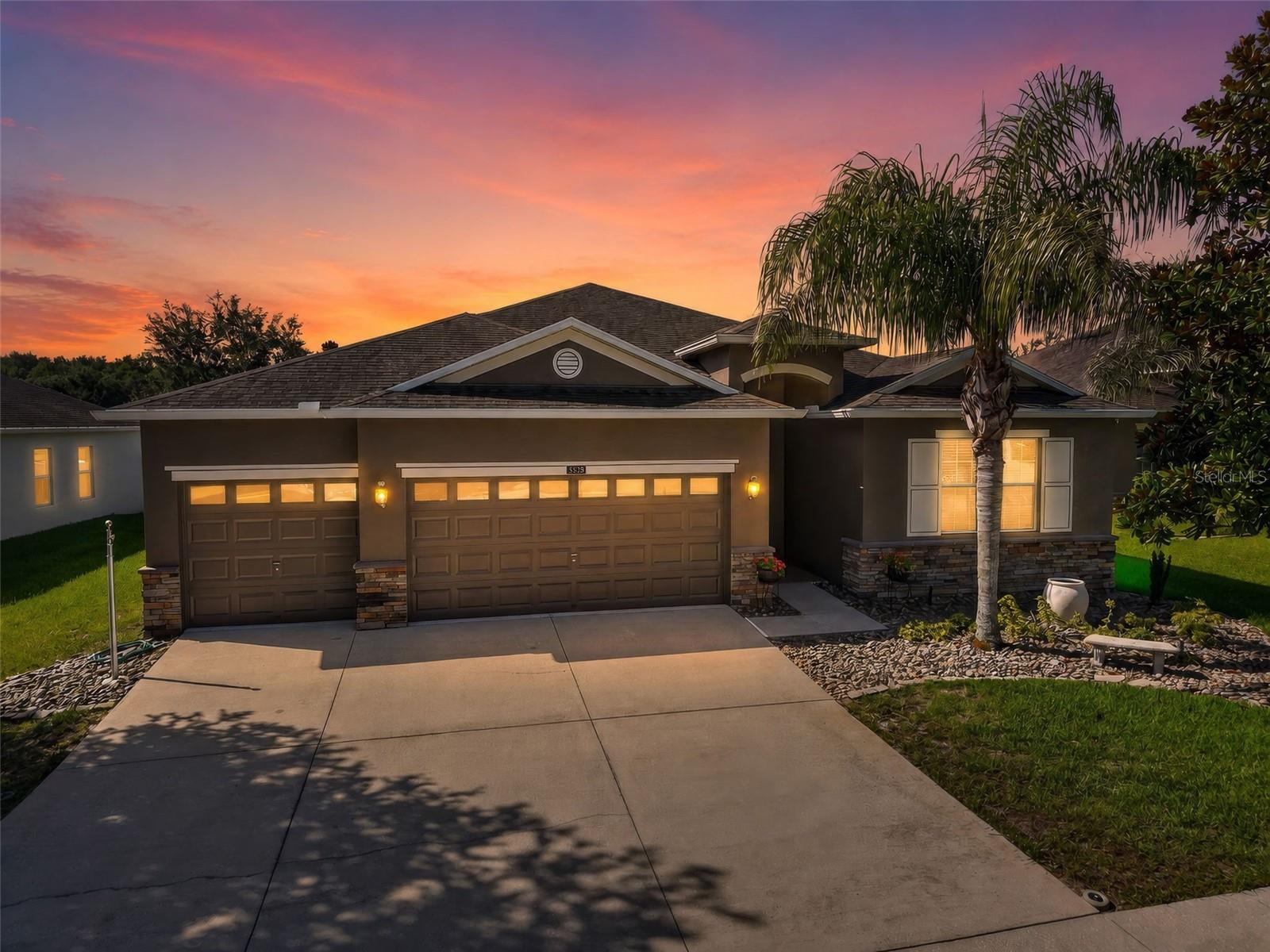 Welcome to this beautifully maintained 3-bedroom, 3-bath home with a additional bonus room in the sought-after guard-gated community of Stoneybrook Hills. Offering 2,558 square feet of thoughtfully designed living space, this move-in ready home features an open floor plan with crown molding, abundant natural light, and spacious living and dining areas ideal for everyday living and entertaining.

The well-appointed kitchen boasts quartz countertops, stainless steel appliances, abundant cabinetry, a breakfast bar, and a sunny breakfast nook perfect for casual dining. The kitchen flows seamlessly into the spacious family room, making it ideal for gatherings. The private primary suite features two walk-in closets and an en-suite bath with a walk-in shower, soaking tub, and private water closet. The two additional bedrooms are thoughtfully situated for privacy, each with convenient access to its own full bathroom. The bonus room serves perfectly as an office/den providing flexibility for remote work, hobbies, or guests and also offers the potential to be converted into a fourth bedroom, as a closet located on the adjoining wall could be reconfigured to serve the room.

Enjoy Florida living year-round from the large screened lanai overlooking the fenced backyard and paver patio. Additional highlights include a three-car garage currently configured with a partition separating the third bay, creating flexible space for storage, a workshop, or hobbies. The partition could be removed (buyer to verify), allowing for full three-car parking or an ideal setup for two vehicles and a golf cart. Additional improvements include a new HVAC system (2021), newer water heater, freshly painted exterior, an irrigation system, and an inside laundry room.

Residents of Stoneybrook Hills enjoy resort-style amenities including a clubhouse, fitness center, community pool, tennis and basketball courts, playground, walking trails, and 24-hour guard-gated security. Conveniently located just minutes from historic downtown Mount Dora, shopping, dining, parks, and the 429 Expressway, this home offers the perfect combination of comfort, convenience, and community.