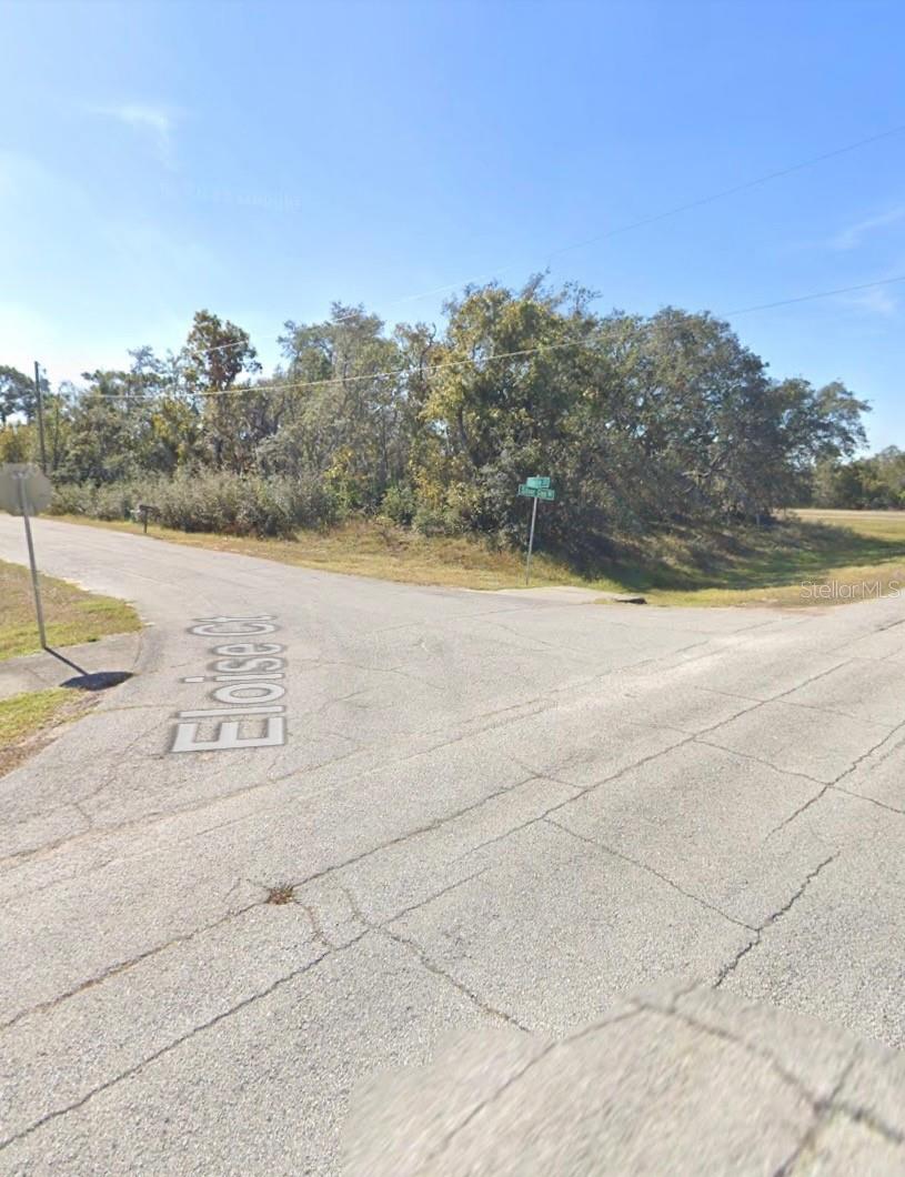 Nice Corner Lot, Neighborhood 2, Village 7 in Polk County. Nearly  a quarter of an acre, all high and dry in desirable area, close to Lake Marion Golf Resort.  Home prices starting in mid $200's.  Address should be 1541 Eloise Ct.