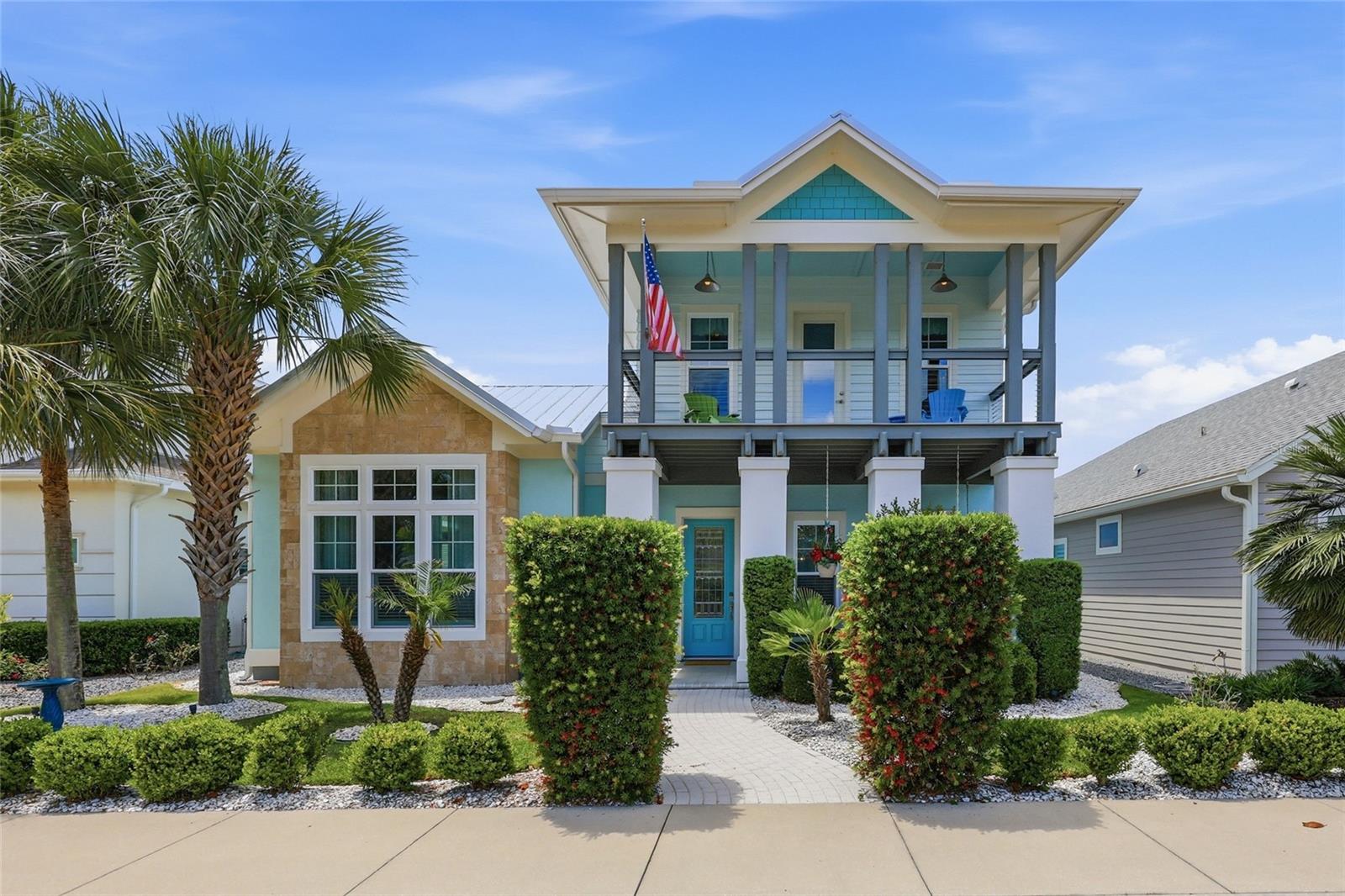 Your private island-inspired retreat in the heart of west Gainesville’s highly coveted Town of Tioga awaits. Positioned on a quiet horseshoe cul-de-sac with no through traffic, this nearly 4,000 square foot custom pool property blends timeless coastal architecture with an effortless sense of comfort, creating a place that feels refined and relaxing from the moment you arrive.
Inside, natural light pours through expansive windows and sliding glass doors, casting a warm glow across the open living spaces. Ten foot ceilings, vaulted wood-beamed details, and neutral luxury vinyl plank flooring enhance the airy coastal feel while maintaining an elevated sense of style.
At the heart of the home, the chef’s kitchen brings everyone together. Premium appliances, an oversized breakfast bar, walk-in pantry, and built-in ice maker make entertaining seamless, while the open flow into the dining and living areas allows gatherings to unfold naturally. Large sliders in the living room and kitchen extend the space outdoors, embracing the Florida lifestyle year round. A dedicated pool bath adds convenience for guests.
Tucked privately on the main floor, the primary suite feels like a luxury resort escape. Wake up to views of the pool, enjoy morning coffee from the in-room coffee bar, and unwind in the spa-inspired bath featuring a soaking tub, dual vanities, separate water closet, and oversized walk-in closet with a dedicated laundry area. Vaulted wood-beamed ceilings and direct access to the pool courtyard elevate the sense of serenity.
Upstairs offers flexibility for modern living. A spacious bonus room currently functions as a home gym and includes a plumbed closet for future guest or multigenerational living. Adjacent, a secondary lounge with wet bar and refrigerator creates the perfect setting for movie nights or relaxed evenings with friends. The expansive family room easily accommodates seating and recreation space for a billiards or card table.
Three additional bedrooms complete the upper level, including one with an ensuite bath and dual walk-in closets, along with a hall bath and second laundry area.
Outside, the atmosphere feels more like a private getaway than a traditional backyard. The Key West style dipping pool anchors a secluded courtyard framed by paver patios and lush landscaping, creating an intimate setting for quiet mornings, sunset cocktails, or weekends spent entertaining.
Built with enduring quality in mind, the property features a concrete block first floor and durable metal roof. Recent updates to the pool and irrigation system further enhance the move-in ready appeal. Unlike building new construction, this property offers the rare opportunity to enjoy a fully completed custom residence without the lengthy timelines and unexpected costs associated with the process.
Located just two minutes from Tioga Town Center, residents enjoy immediate access to restaurants, boutiques, entertainment, fitness studios, healthcare services, and everyday conveniences including Publix, Aldi, and Starbucks. Community amenities include scenic walking trails, a resort style pool and hot tub, tennis courts, basketball courts, sand volleyball, playgrounds, and a community garden.
This is a rare opportunity to own a nearly new, move-in ready luxury property in Town of Tioga, where custom coastal design, everyday comfort, and exceptional entertaining spaces create a lifestyle that feels like a permanent vacation.