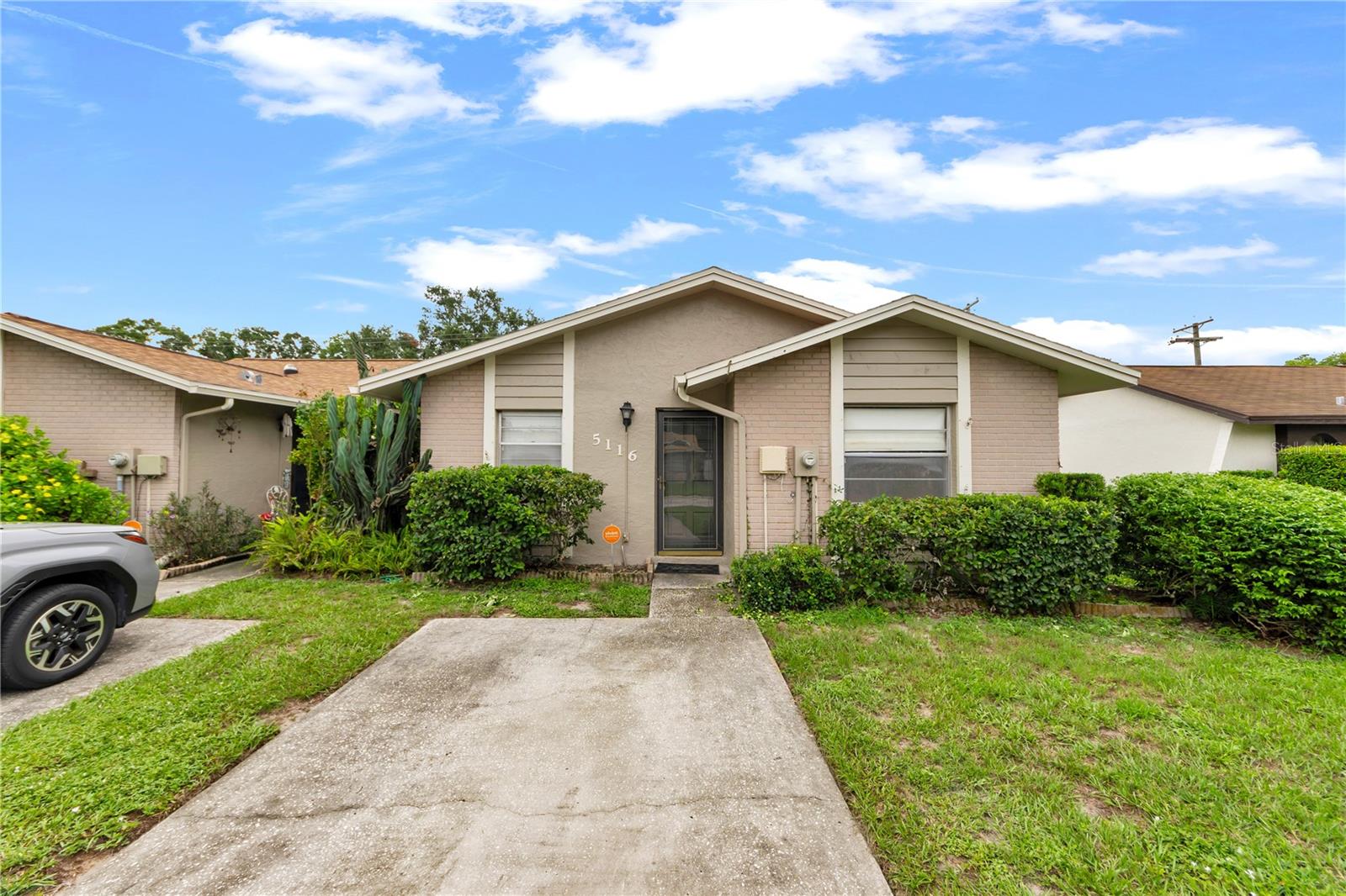 Welcome to this charming 2-bedroom, 2-bathroom single-family home located in the desirable Carrollwood area. The open floor plan creates a comfortable and inviting layout, perfect for everyday living. Situated along a quiet, peaceful road, the home offers a relaxing setting while remaining conveniently close to everyday necessities, restaurants, grocery stores, shopping, and major roadways. Step outside to enjoy the screened-in patio overlooking the quiet, fully fenced backyard, providing privacy and plenty of space for pets, outdoor gatherings, or simply unwinding. Residents also have access to a community pool, offering another great way to enjoy the Florida lifestyle. The home is located approximately one mile from Carrollwood Village Park, where you can enjoy walking trails, playgrounds, sports courts, a splash pad, and additional outdoor recreation. EOS Fitness is also conveniently located approximately two miles away. With Tampa International Airport about 30 minutes away and the nearest beach approximately 45 minutes away, this home offers a wonderful combination of comfort, privacy, recreation, and accessibility.