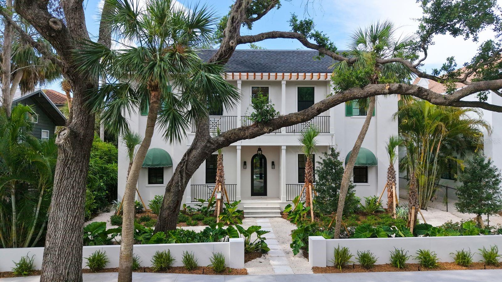 One or more photo(s) has been virtually staged. Drive under the serene canopy of oaks, and you will arrive at 1658 Bonita Lane, a  brand-new custom construction, classic Spanish design inspired by the refined and timeless architecture of Palm Beach, Florida. Connected to nature with a quiet elegance, this residence features just under 4,000 square feet of 5 bedrooms, 4.5 baths and lots of versatility with an upstairs bonus room, including a mother in law suite and sitting room- perfect for guests or a home office. Privacy abounds from both the lush landscaping that surrounds the property and its unique position spanning the entire block with a back entry garage off of Bay Road. Soft sunlight cascades in through the two stories of oversized windows over the Great Room that opens both onto the beautifully designed kitchen and to the pool. 

The backyard oasis has been thoughtfully designed with a Cypress clad covered patio, Astro turf surrounding the pool to ensure lush greenery year-round, and space for the new owners to design their own outdoor kitchen. Granada Park is a special, tucked away neighborhood, quiet for its residents without a lot of traffic, yet only a few minutes away from our world famous Siesta Key beaches, and downtown Sarasota. Come admire the meticulous details of this home yourself, and then make it yours for your family to enjoy forever. The majestic palms and Giganteum Elephant Ear plants framing this special home are welcoming your arrival!