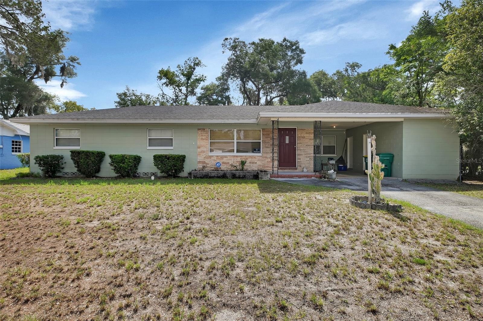 Welcome to DeLand! This charming home sits on a spacious corner lot just minutes from downtown and SunRail. Inside, you’ll find 3 bedrooms and 2 full bathrooms. The kitchen features real wood cabinets, and the home showcases beautiful original hardwood floors throughout. There’s also a bonus room that’s perfect for entertaining, a playroom, or a cozy family space. Outside, the fenced backyard  includes a covered porch—great for relaxing or hosting gatherings. Centrally located, this home offers easy access to the beaches, theme parks, and everything Central Florida has to offer.
