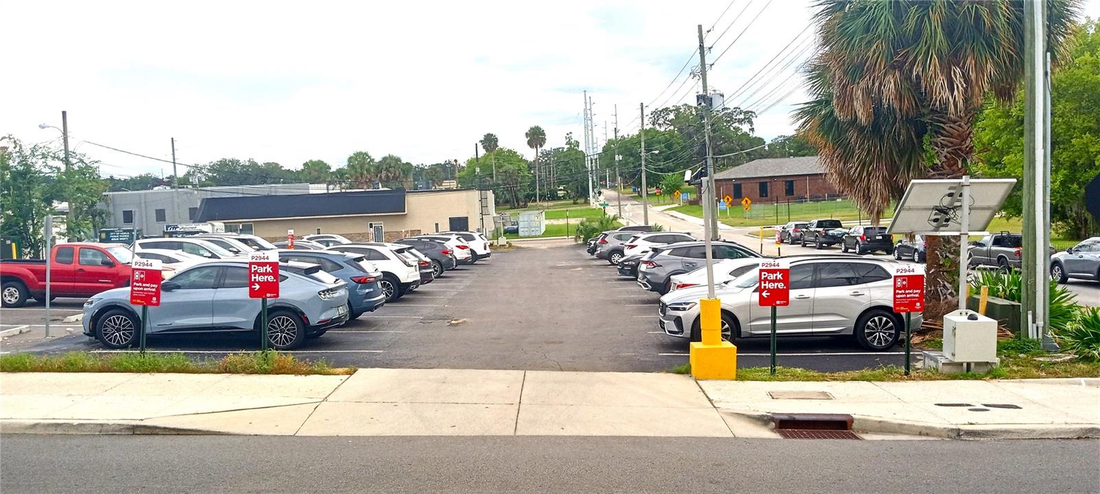 In the heart of fast growing downtown Ocala for sale is this fully functioning 45 space parking lot. This parking lot is vital to the downtown area and provides a great location for visitors. Weekends, holidays and events bring parking challenges with the towns main garage even reaching full capacity. The parking equipment is currently leased and the buyer can continue the lease or have the equipment removed. The parking lot can be redeveloped into 12 Town homes, 20+ condos, Mixed-Use, Restaurant, Bar, Brewery, Spa Salon, Boutique Hotel, Event Venue and more if desired. The owner has designed the site for a future 24 unit apartment project but you could do whatever you want with the property. The Concept design is included with the sale. The seller has a recent survey available which also would be transferred with the sale along with an Environmental study indicating the site is clean. Across the street, 110 SW Fort King (vacant lot) is also for sale by the same owner. See MLS listing OM707230  The property value for this property will only increase with time as more nearby land gets redeveloped. The seller has a concept design and 3D images for the proposed design available.