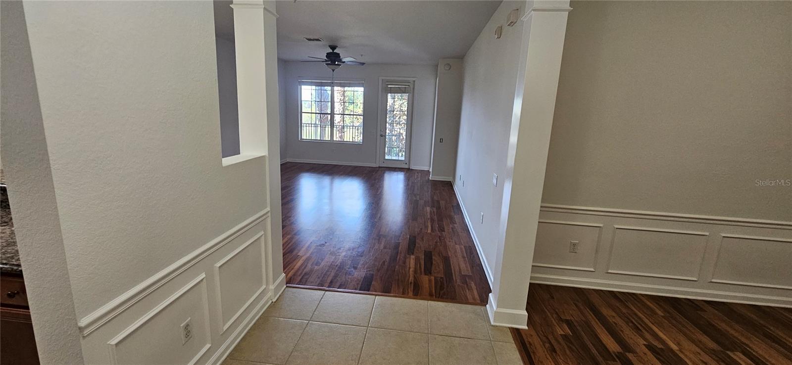 This beautiful 2nd floor unit condo in the gated Stonebridge Reserve, offers 3 bedrooms, 2 baths, a separate dining that can be converted as an office.  Gourmet kitchen featuring granite counter top, 42" cherry wood cabinets and stainless steel appliances, breakfast bar, separate dining room, split floor plan. The master bedroom is huge! and has a large walk-in closet, his and her vanities and roman tub in the master bath with separate shower. Large living room, upgraded light fixtures, separate utility room with washer/dryer, two more spacious bedrooms and outside storage room. Enjoy breathtaking views of Turkey Lake from your covered and screen enclosed balcony while enjoying your morning coffee and/or evening beverage. The Stonebridge Reserve offers gated entry, includes a community center, work-out room, tennis court, pool with deck and one covered garage parking space.  The building offers secured entry to grand lobby, carpeted hallways and ELEVATOR!! Come see this beautiful condo with the amazing view!!