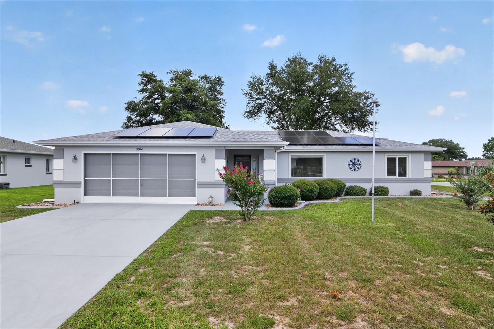 Welcome home to this beautifully maintained 3-bedroom, 2-bathroom block home located on a spacious corner lot in a desirable 55+ HOA community with clubhouse, pool, and tennis court amenities. Offering 1,498 sq ft of comfortable living space, this home features a bright open layout, tile flooring throughout, a welcoming dining area, and a spacious kitchen with plenty of cabinet storage, breakfast bar seating, a brand-new refrigerator, and updated appliances.

The home has been thoughtfully cared for with major updates already completed, including a roof replaced approximately 3 years ago, interior/exterior paint completed approximately 2 years ago, and upgraded weather-proof/noise-reducing windows for added comfort. Enjoy the convenience of an indoor laundry room with storage and a utility sink, plus a screened garage area and great curb appeal.

Move-in ready and full of value, this Ocala gem offers comfortable, low-maintenance Florida living in a peaceful, amenity-filled community.