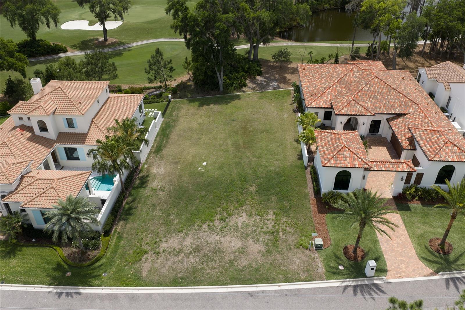 Pre-Construction. To be built. Private Collection Custom Spanish-Mission Style Luxury Villa by AR Homes (Arthur Rutenberg) on the Golf Course in Avila  -  Wake up to sweeping golf course and water views as you build your custom dream home in Avila, one of Tampa Bay’s most sought-after guard-gated communities.
Perfectly positioned along the 2nd tee box, this custom-designed villa offers a rare blend of privacy, scenery, and timeless design.
At the heart of the home, a private interior courtyard creates a true resort-like setting, featuring a pool, spa, and outdoor kitchen designed for year-round Florida living.
Inside, a well-designed layout includes a luxurious owner’s retreat, private guest suite/casita, expansive great room, and second-floor bonus space, offering flexibility for family and guests.
This home is part of AR Homes’ Private Collection, representing their highest level of design, finishes, and craftsmanship—featuring a chef’s kitchen with Wolf and Sub-Zero appliances, a dedicated wine storage feature, and a curated selection of high-end materials throughout.
Permit has been approved, allowing a faster path to construction. There is still time for a buyer to personalize selections and tailor the home to their individual style.
This is a unique opportunity to own a custom home on the golf course in Avila—combining location, design, and personalization in a way that is rarely available.
Contact the listing agent for full specifications, design options, and timeline details.