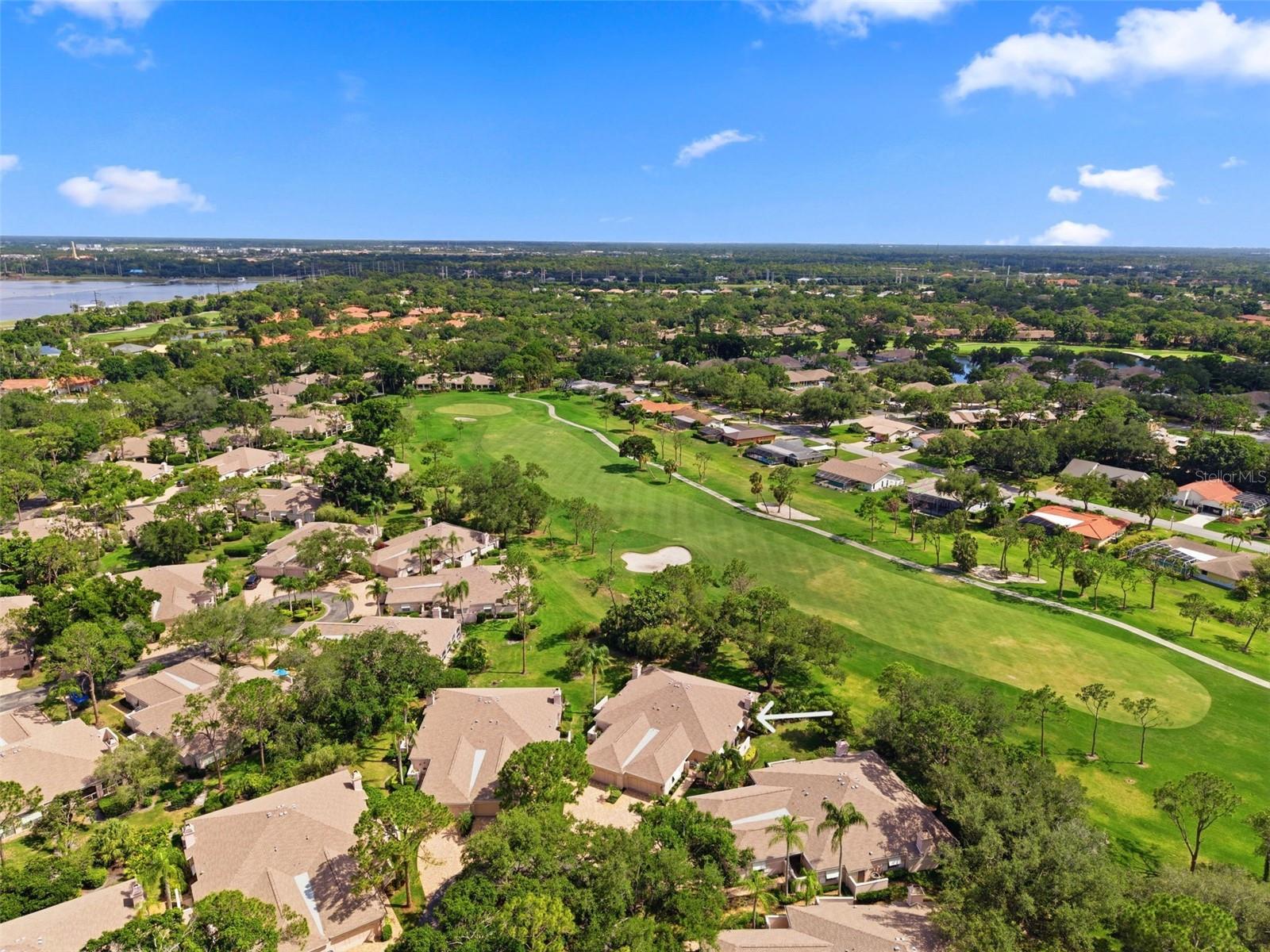One of a kind! Beautifully updated villa on the 14th fairway of the Meadows Golf Course. Enjoy stunning golf course views from the builder’s choice lot in Chanteclaire.
Fully updated in 2023, the interior features luxury vinyl flooring, crown molding, and abundant natural light. The open kitchen boasts stainless-steel appliances, Malibu quartz countertops, a new tile backsplash, and Oxford Maple soft-close cabinetry with direct access to the grilling patio. Perfect for entertaining, the living room includes new custom cabinetry, a matching quartz countertop, and a built-in wine fridge. The spacious primary suite serves as a true retreat, complete with a custom walk-in closet and a sliding door that opens to peaceful nature views.
The present owners have added extensive premium updates for ultimate comfort and peace of mind. The home features full-height, custom PGT hurricane-rated windows and doors throughout, powered aluminum hurricane shutters, and plantation shutters in the dining room and bedrooms. Mechanical and structural upgrades include a high-efficiency Trane variable-speed HVAC unit and a new shingle roof installed in 2025 with 71 additional joist clips for enhanced wind protection. This property sits at a 33-foot elevation in Flood Zone X, making it the perfect choice for a secure, lock-and-leave Florida lifestyle.
Outside, a quiet cul-de-sac location, paver driveway, and charming courtyard welcome you home. Mature shade trees, colorful sunsets, and a daily parade of local birds frame the golf course views. The villa is also just a short stroll from two heated community pools.
The comprehensive HOA fee covers exterior insurance, maintenance-free yard care, irrigation, pest control, exterior cleaning and painting, roof maintenance, dryer vent cleaning, neighborhood pools, and basic cable.
Set within the 1,600 park-like acres of The Meadows, this resort-style community offers an active social calendar, 14 miles of scenic trails, championship golf courses, a junior Olympic pool, pickleball, Har-Tru tennis, and a fitness center. You are located just 15 minutes from downtown Sarasota, Bradenton, Lakewood Ranch, and Sarasota International Airport, and mere minutes from Whole Foods, Trader Joe’s, Nathan Benderson Park, the Legacy Trail, and premier dining at University Town Center. Experience worry-free Florida living at its finest!