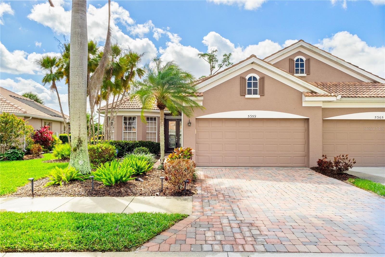 New Roof Ordered & On The Way!  Enjoy the Florida lifestyle in this beautiful, updated,TURNKEY FURNISHED, move in ready, villa located in the exclusive gated golf course community of Heron Creek Golf and Country Club. This over 1700 sq ft  tastefully decorated villa  offers 2 bedrooms, 2 baths plus an office/den/study and 2 car garage. As you enter the home through the leaded glass double doors you are greeted  by tile on the diagonal and view to the lanai that looks out to Marsh #9 tee box.  The remodeled kitchen is a chef’s delight featuring Stainless Steel appliances with gas cooking, granite countertops and breakfast bar, complimented by tile backsplash, and beautiful  cabinetry with under and over  cabinet lighting. Then enjoy the views  and watch the golfers tee off from the breakfast nook with aquarium window… the perfect place to start your day. The living room, accented and sliders out to the the lanai area is a nice gathering spot for family and friends. Check out the huge expanded  owner’s suite! The cozy sitting area in the owner’s retreat invites you to relax and take in the views of the golf course and serene lake.  The ensuite bath has a gorgeous, huge walk-in shower with glass block, granite countertops, rich cabinetry, and linen closet. This home is a true split floor plan with the nice size guest bedroom located on the opposite side of the home and has it’s own bath with shower/tub combination. The light and bright office located in the front of the home features double entry doors and triple bay windows allowing for natural light. The spacious laundry room boasts ample counter space,  an abundance  of cabinetry providing lots of extra storage. So many extra touches in this beautiful home such as  tile on the diagonal throughout the main living area, engineered hardwood in the  bedrooms and office, neutral color palette throughout,TURNKEY FURNISHED and a very short golf cart ride to the Clubhouse.  This exquisite home combines sophistication and comfort for a truly enjoyable living experience. In Heron Creek Golf and Country Club there is a plethora of activities…27 holes of golf on the Arthur Hills designed golf course, major practice facility, 5 Har Tru lighted tennis courts, resort style pool and spa, fitness center, 21,000 sq ft Clubhouse offering fine and casual dining choices. One could say there is something for everyone. Heron Creek is close to beaches,Warm Mineral Springs, Cool Today Park, shopping and restaurants. NOW is the time to make this home yours today!