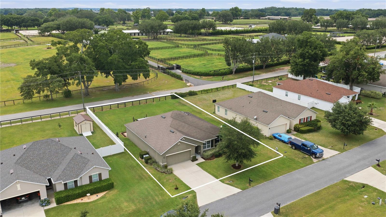 Rarely does a home offer the perfect balance of privacy, convenience, and views. Built in 2016, this well-maintained 4-bedroom, 2-bathroom home encompasses over 1,950± square feet and is ideally positioned in Ocala's rapidly growing southwest corridor. Featuring a spacious open floor plan, split-bedroom design, two-car garage, and full-size laundry room, the home is thoughtfully designed for both everyday living and entertaining.
The true standout is the screened rear patio overlooking rolling farmland to the west, providing peaceful views and breathtaking sunsets seldom found within city limits. With only two neighboring homes, you'll enjoy a quiet, country-like setting without sacrificing access to modern conveniences.
Located just minutes from shopping, restaurants, medical facilities, major employers, and Interstate 75, this property places everything Ocala has to offer within easy reach. Downtown Ocala is only 19 minutes away, while equestrian enthusiasts will appreciate being just 15 minutes from the World Equestrian Center and 20 minutes from the Florida Horse Park. Whether you're seeking convenience, tranquility, or a prime location in one of Ocala's most desirable growth corridors, this property delivers the best of both worlds.
