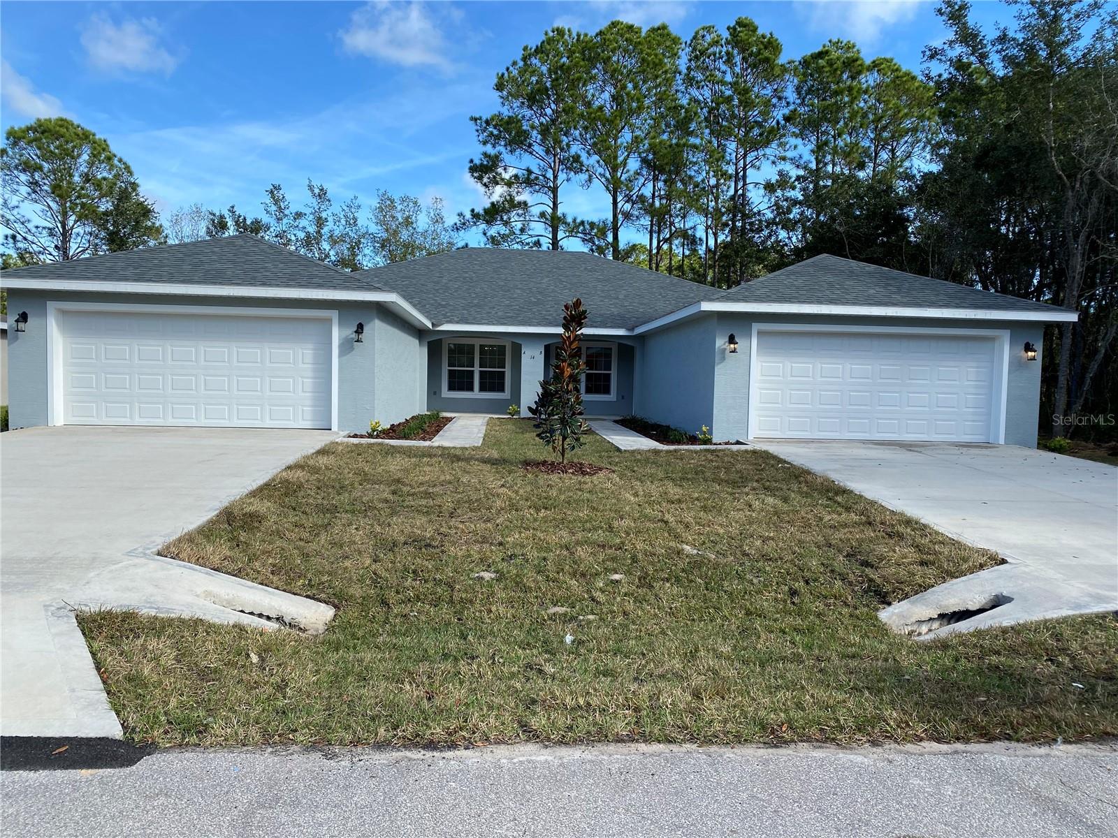 One or more photo(s) has been virtually staged. LARGE SPACIOUS DUPLEX WITH LONG-TERM TENANTS – PRIME PALM COAST LOCATION | NO HOA

Excellent investment opportunity with strong income potential and low owner expenses. This spacious duplex is located in a desirable Palm Coast neighborhood near schools, shopping, dining, major roadways, parks, and just minutes from the beach.

Each unit features 4 bedrooms, 2 bathrooms, a 2-car garage, and an inside laundry room. Spacious living areas showcase soaring vaulted ceilings that create an open and airy atmosphere. The open-concept kitchen offers a large pantry, beautiful cabinetry, granite countertops, and overlooks the fully tiled living space.

BOTH units have kitchen stainless steel appliances including refrigerator, range, microwave, dishwasher, clothes washer, and dryer are included. Vertical blinds throughout the property are also included.  Washer and dryers included in both units.

Electric and water are separately metered, with utilities paid directly by tenants—helping keep ownership expenses low and maximizing efficiency.

INCOME INFORMATION:

Total Gross Monthly Income: $3,630/month
Projected Annual Gross Income: $43,560

Unit A: Currently leased at $1,705/month
Lease expiration: June 30, 2026
Unit B: Currently leased at $1,925/month
Lease expiration: December 31, 2026

Approximate Annual Expenses:
• Lawn Care: $1,200
• Property Taxes (2025): $6,908.14
• Insurance: Approximately $1,800

Approximate Net Annual Income: $33,651.86

?? SPECIAL BUYER INCENTIVE: Professional Property Management INCLUDED for 1 full year through The Cavalieri Property Management.

Whether you are expanding your investment portfolio or seeking a strong income-producing property with built-in cash flow and long-term tenants already in place, this duplex offers location, size, stability, and excellent upside potential. Schedule your private showing today.