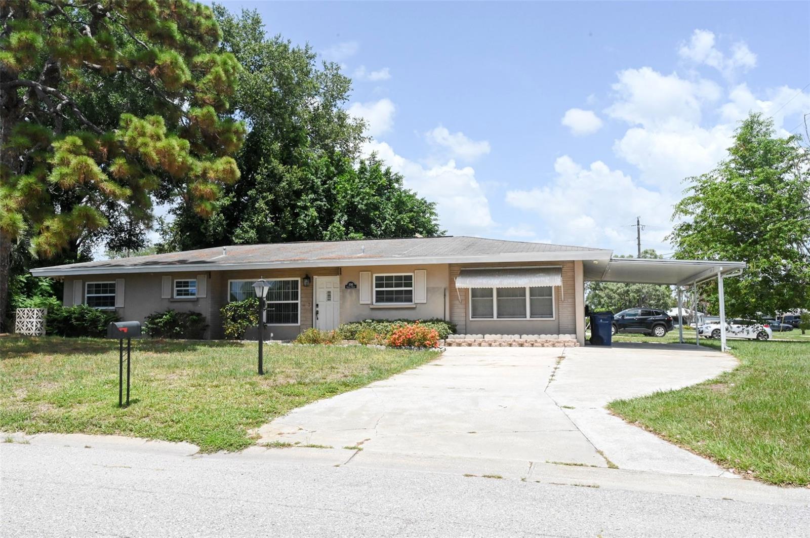 Welcome to this charming 3-bedroom, 2-bathroom Sarasota home situated on a spacious corner lot in the highly desirable 34235 zip code.
From the moment you step inside, you'll be greeted by a bright and welcoming living room filled with natural light from a large front window, creating the perfect space to relax while enjoying views of the beautifully shaded front yard. Just beyond the living room, you'll find a comfortable family room that offers additional space for gathering with family and friends.
Adjacent to the family room is a large private office, making it an ideal space for working from home, pursuing hobbies, or creating a quiet retreat away from the main living areas.
Outside, the expansive backyard offers endless possibilities for entertaining, gardening, or designing your own outdoor oasis. A like-new utility shed provides convenient storage for lawn equipment, gardening tools, or seasonal items. A beautiful mature pine tree adds character to the property while providing abundant shade, creating a peaceful setting to enjoy Florida's outdoor lifestyle. As an added bonus, the property includes a fully functional private well, offering a convenient water source for irrigation and helping reduce outdoor water costs.
Designed with convenience in mind, the home features a welcoming front entrance plus two additional exterior access doors, providing easy entry from the side and backyard. This thoughtful layout makes everyday living, outdoor entertaining, bringing in groceries, or accessing the yard especially convenient.
This home offers excellent curb appeal, a functional floor plan, and a fantastic opportunity to add your own personal style and updates. Conveniently located just minutes from UTC Mall, shopping, dining, local parks, top-rated schools, and Sarasota's world-famous Gulf beaches, you'll enjoy the perfect balance of comfort and convenience.
Don't miss your chance to make this wonderful property your own. Schedule your private showing today!