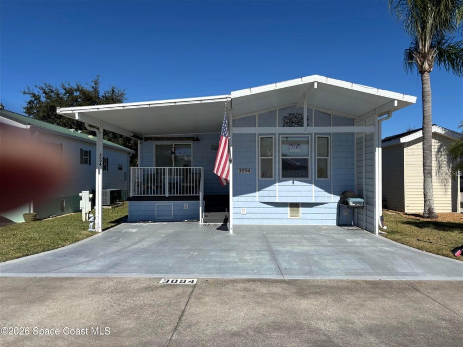 This home has been lovingly remodeled! You will fall in love with the new kitchen, which includes all gray and white cabinets. There is large deep sink, a coffee bar, microwave drawer, dishwasher and a range with decorative range hood. The living area includes custom made room darkening shades. There are two bedrooms, with a large master able to fit a king size bed and include lots of room for storage. There are two bathrooms, one with a large shower, lovely tile and washer/dryer, the other bath includes a tub. You can enjoy the covered patio with composite deck in the front or the paver patio in the back, ready for your barbecue. A large storage cabinet sits in the back. Willow Lakes is an active 55+ community, which includes a heated pool, tennis, pickleball, shuffleboard, bocce ball and other activities in the clubhouse. There is a 9-hole executive golf course on the property available for affordable membership. Located close to airports, beaches, shopping and theme parks.