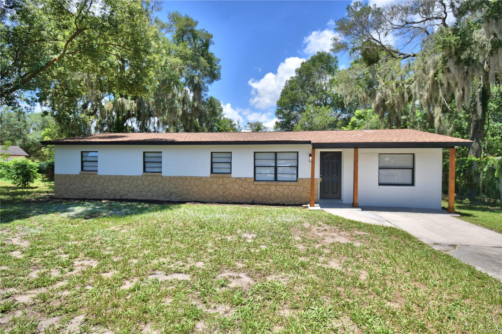Move-in ready 4-bedroom, 2-bath home located on a quiet cul-de-sac in DeLand! This beautifully updated home offers the perfect combination of comfort and modern style. Major improvements include a new roof (2024) and new A/C, providing peace of mind for years to come.The stunning kitchen features new cabinetry, quartz countertops, and stainless steel appliances, making it ideal for everyday living and entertaining. Enjoy new flooring throughout, beautifully renovated bathrooms with new tile showers and finishes, and fresh interior and exterior paint that gives the home a bright, modern feel. Step outside to a spacious, fully fenced backyard with mature fruit trees, offering plenty of room for outdoor activities, gardening, or relaxing in your private oasis. Conveniently located on a peaceful cul-de-sac, this home is close to shopping, dining, schools, parks, and major highways while still offering a quiet neighborhood setting. Don’t miss this exceptional opportunity—schedule your private showing today!     All information provided is believed to be accurate but is not guaranteed. Buyer and buyer’s agent are responsible for independently verifying all information, including, but not limited to, square footage, room dimensions, lot size, measurements, zoning, permits, HOA information, and any other property details.