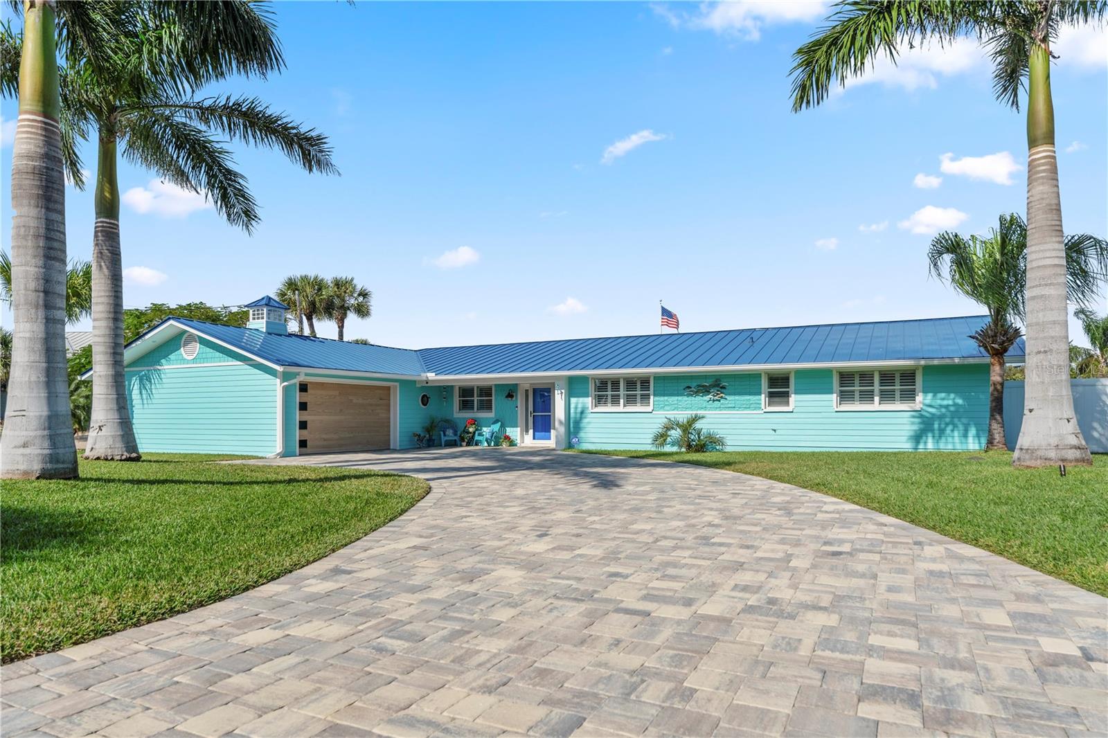 Come tour this elegant coastal resort-style home. Located canal-front just off the Intracoastal, enjoy those big-water views as you sit by the newly built pool and spa.  An open-concept floorplan enables natural light to flow throughout the home.  The large living room features a gas fireplace and provides plenty of space for common area living and hosting.  The home has recently been remodeled, adding upgrades and luxuries inside-out to enhance its beauty, entertainability and Florida waterfront lifestyle:  2019 NEW FLOATING DOCK and BOAT LIFT ROOF, 2020 HEATED POOL WITH SPA AND PAVER DECK, SUMMER KITCHEN and POOL BAR.  Upgrades throughout the house include a brand new CHEF'S KITCHEN WITH BUTLER'S PANTRY with new CUSTOM CABINETS, STAINLESS STEEL APPLIANCES AND GRANITE COUNTERTOPS.  NEW AC 2024, NEW GAS TANKLESS WATER HEATER 2025, NEW GARAGE DOOR AND EPOXY GARAGE FLOORING.  Upgraded BRAND NEW 50+ year METAL ROOF!  The location is conveniently located just two blocks from the beach, and close to Dunlawton Bridge for quick and easy mainland access.  Great fortune comes to those who TAKE IMMEDIATE ACTION when opportunity presents itself.  Come tour this beautiful waterfront home today!