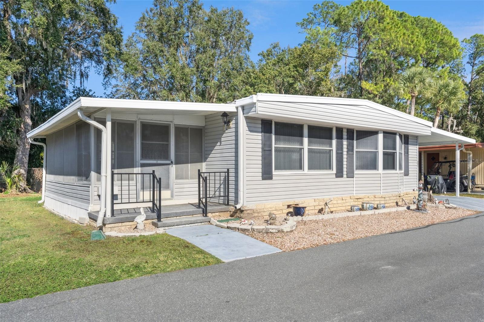 Enjoy relaxed Florida living in the 55+ community of Eustis Country Club Manor. This well-maintained
2-bedroom, 2-bath home offers a spacious open floorplan with both a large living room and an oversized
family room, providing the perfect setting for entertaining, hobbies, or simply unwinding in comfort. The bright,
airy layout allows for easy everyday living, while the carport adds convenience. Residents enjoy a
low-maintenance lifestyle with a co-op fee of $243 per month, which includes water, trash, sewer, clubhouse
access, and a variety of community amenities. Ideally located near shopping, dining, medical facilities, and
parks, with easy access to Orlando and the 429 extension, making travel, entertainment, and visits with family
a breeze. Schedule your private showing today and discover the lifestyle you’ve been looking for.  The co-op has pet restrictions, no pets unless they are service animals or emotional support animals. Please call Co-op office with any specific questions.