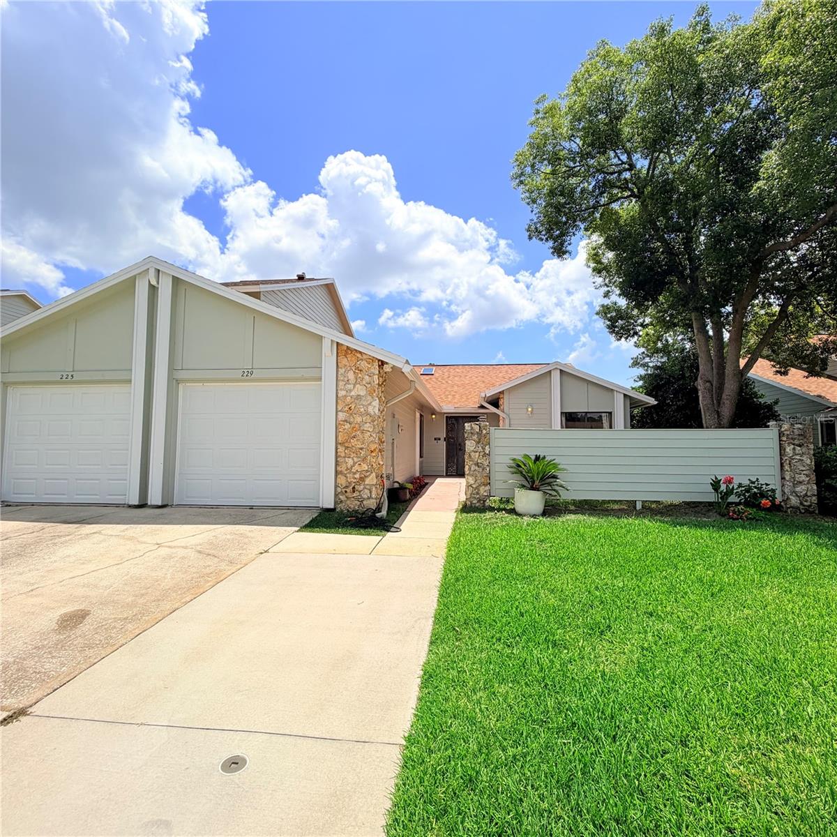 Welcome to this beautifully maintained 3-bedroom, 2-bath home located in the desirable gated community of Pelican Bay. Offering approximately 1,520 square feet of living space, this home features an open floor plan with soaring ceilings, abundant natural light, and a spacious living area designed for comfortable everyday living. The enclosed Florida room provides the perfect place to relax while enjoying peaceful views of the golf course and water.
The well-appointed kitchen offers ample cabinet and counter space, while the split-bedroom layout provides added privacy. The primary suite features an en-suite bath and generous closet space. A one-car garage, interior laundry area, and beautifully maintained landscaping complete the home.
Conveniently located just minutes from I-95, I-4, shopping, restaurants, Embry-Riddle, Daytona State College, the Daytona International Speedway, and the area’s beautiful beaches. Lawn care is included. Don’t miss this opportunity to enjoy low-maintenance living in one of Daytona Beach’s premier gated golf course communities.