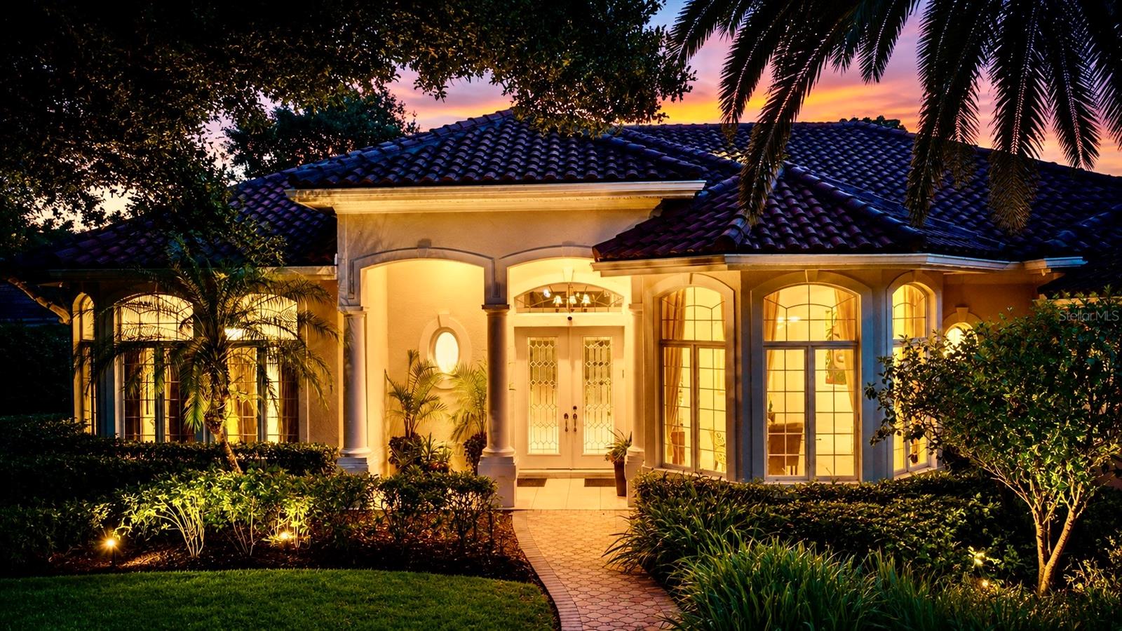 Tucked behind the private gates of The Oaks Club side, in one of Sarasota’s most prestigious and sought-after country club enclaves, this exquisite residence captures the essence of refined Florida living. Ideally situated just moments from the clubhouse and overlooking the manicured fairways of the Eagle Course, the home offers a rare blend of privacy, scale, and serene golf course vistas that stretch endlessly from the expansive screened lanai.  Spanning over 3,500 square feet, this beautifully appointed single level home features three generously sized bedrooms, a dedicated office, and three-and-a-half baths, all thoughtfully designed to balance sophistication with everyday comfort. From the moment you enter, a sense of understated elegance unfolds—gracious formal living spaces anchored by a statement fireplace, soaring tray ceilings, intricate crown molding, and an abundance of natural light that enhances every architectural detail.

The primary suite serves as a true retreat, offering impressive proportions, a substantial walk-in closet, and a spa-inspired bath designed for relaxation. Additional living spaces flow effortlessly, including a well-equipped laundry room with custom built-in workspace, ideal for modern living. Every inch of the home reflects careful attention to detail, from the finishes to the functional layout.  Outdoors, the residence truly shines. The screened lanai becomes a private sanctuary, complete with a sparkling pool and spa, perfectly positioned to capture sweeping views of the 4th hole. Whether entertaining guests or enjoying quiet evenings, this space delivers an elevated indoor-outdoor lifestyle synonymous with luxury coastal living.  Enhancing both comfort and peace of mind, the home is equipped with a whole-house generator, and Security Camera's outside and the oversized three-car side entrance garage and circular paver driveway provide both convenience and impressive curb appeal. Quick notes to take away: Roof - 2023 / A/C (both units) - 2024 

Ownership within The Oaks grants access to an unparalleled private club experience. Residents enjoy two championship 18-hole golf courses, impeccably maintained HAR-TRU tennis courts, newly introduced pickleball facilities, and a state-of-the-art Wellness and Fitness Center exceeding 7,500 square feet. Complemented by an exceptional culinary program and a vibrant calendar of curated social events, The Oaks offers a lifestyle defined by elegance, activity, and connection. Club membership is required, within this distinguished Sarasota community.