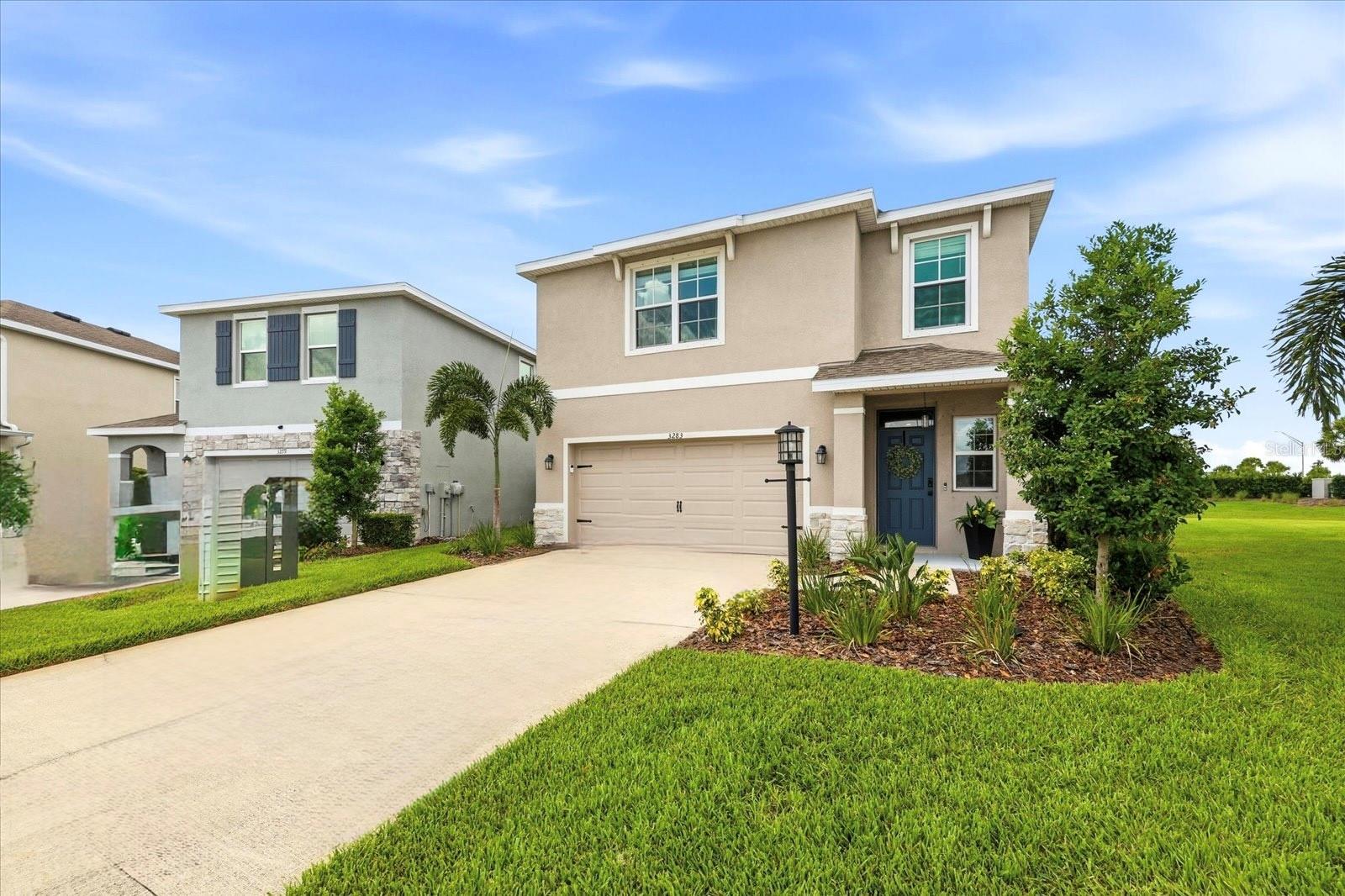 SHOWS LIKE A MODEL! PERFECTLY APPOINTED DARWIN FLOOR PLAN WITH A HEATED SALTWATER POOL IN STAR FARMS AT LAKEWOOD RANCH! Perfectly positioned on an oversized pie-shaped homesite overlooking a tranquil pond, fountain, and expansive green space, this impeccably maintained 2,007-square-foot two-story home offers 3 bedrooms, 2.5 baths, a spacious loft, and a 2-car garage. Every space has been thoughtfully enhanced with timeless finishes, creating a home that is as stylish as it is functional. From the moment you step inside, you'll appreciate the bright, open floor plan, abundant natural light, and warm neutral color palette that complements any décor. The spacious great room flows effortlessly into the dining area and kitchen, making everyday living and entertaining a pleasure. Decorative upper cabinetry gives the kitchen a custom designer feel, while expansive sliding glass doors draw your eye to the spectacular backyard retreat. One of the secondary bedrooms has been transformed into an exceptional home office featuring elegant custom built-in cabinetry, generous desk space, and beautiful designer wall sconces. Whether you're working from home or simply want a quiet place to create, this space is both sophisticated and practical. Should your needs change, it can easily serve as a bedroom once again. Outdoor living is where this home truly shines. The private backyard is designed for enjoying Florida year-round, featuring a heated saltwater pool with an oversized sun shelf, PebbleTec finish, travertine pool deck, and panoramic screen enclosure. The fully fenced backyard provides privacy while showcasing peaceful pond views, a charming fountain, and lush green space beyond—creating a setting that feels both serene and inviting. Upstairs, the versatile loft offers endless possibilities as a media room, game room, fitness area, or second family room. The spacious primary suite provides a relaxing retreat, while the additional bedrooms offer comfortable accommodations for family and guests. Recent improvements include 2025 luxury vinyl plank flooring throughout, 2025 hurricane-impact windows on the second story, updated vanities in the primary bath and powder room, decorative kitchen cabinetry enhancements, and an upgraded staircase featuring an elegant spindle and railing system. Every improvement has been carefully selected to elevate both the style and functionality of the home. Life at Star Farms at Lakewood Ranch continues to get even better. The first phase of the Resort Club Amenity Center is now open, featuring the popular Trade Route Coffee Kitchen, a resort-style pool, state-of-the-art fitness center, athletic performance center, and dog park. Future phases are planned to include a poolside bar and grill, clubhouse, Sunset Terrace, poolside cabanas, beach area, golf cart parking, additional outdoor activity spaces, and even more amenities designed to create an unmatched resort-style lifestyle. Ideally located near top-rated schools, Waterside Place, University Town Center, championship golf, exceptional dining, shopping, and the Gulf Coast's award-winning beaches, this move-in-ready home combines thoughtful upgrades, an incredible outdoor living experience, and one of the most desirable homesites in Star Farms. THIS ONE WILL NOT LAST!