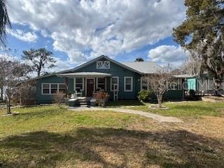 This is a very charming home you'll want to make yours! Located at the end of street for added privacy. Gorgeous views of the lake. Sit by the pool and relax and take in beautiful sunsets. This is a 2bedroom 2 bath home that features a large Bonus room that could easily be divided to make 2 more bedrooms or an in-law suite, the possibilities for this space is endless.
Updated kitchen and baths. Beautiful hardwood floors. If you need a garage and workshop then you'll fall in love with what this property has to offer. A detached garage that is a 3 car with workshop will give you ample room for cars and toys. In addition there is an additional workshop with a roll up door for your mower and yard tools plus a seperate entrance for storage or maybe a "She" shed.
Down by the lake you will find a cozy sitting area with fire pit. This home sits on an oversize lot with approx. 154 ft of water front on Lake Enola that offers fantastic fishing!