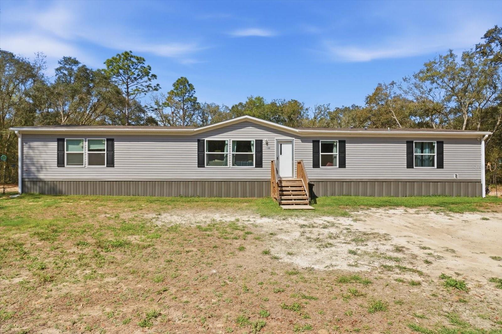 Room to Grow, Space to Love – Your Family’s Next Chapter Starts Here! 

Welcome home to this beautiful 2024 manufactured home offering over 2,052 sq. ft. of thoughtfully designed living space, perfect for growing families or those who simply want room to spread out.
With 5 spacious bedrooms and 3 full bathrooms, everyone can enjoy their own space while still coming together in the heart of the home. Each bedroom is generously sized, making it ideal for kids of all ages, guest rooms, or even a home office or playroom.
The open layout creates the perfect setting for family gatherings, holiday celebrations, and everyday moments that matter most. Whether you’re hosting dinner, helping with homework, or enjoying a cozy night in, this home is built for making memories.

Step outside and fall in love with the 1.25 acres of land—a dream for families! There’s plenty of room for family and pets to run and play, space for a future pool, outdoor entertaining, or even a garden. It’s the kind of property where you can truly enjoy freedom, privacy, and fresh air.
This is more than just a house—it’s a place to grow, gather, and create lasting memories.