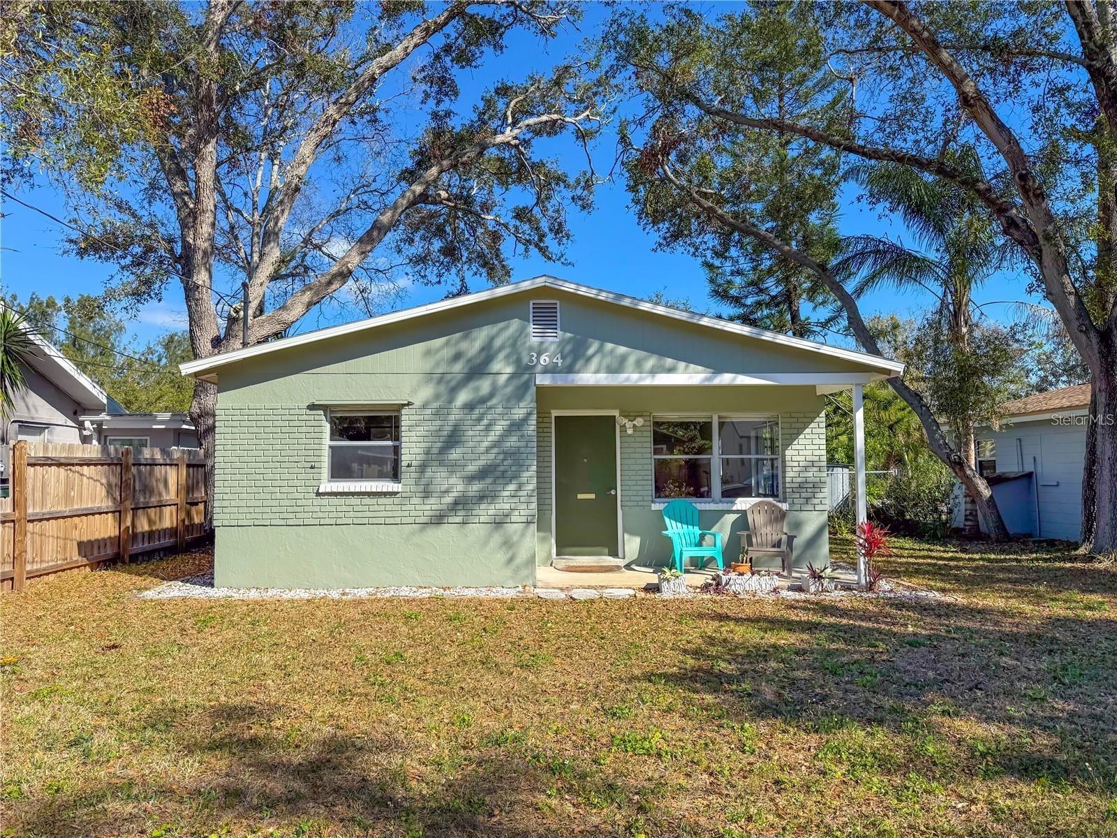 MOVE-IN READY and perfectly positioned in the heart of Largo! This charming 2-bedroom, 1-bath block home offers comfort, convenience, and exceptional value—all located in a NON-FLOOD ZONE. Filled with natural light from an abundance of windows, this well-maintained home features tile flooring throughout the living areas and generously sized bedrooms, each offering spacious double-door sliding closets. The inviting living room provides plenty of space for relaxing or entertaining, while the kitchen has been enhanced with new stainless steel appliances and convenient washer and dryer hookups for added functionality. The bathroom has been tastefully updated with a new vanity and modern fixtures, adding a fresh, contemporary touch. Additional features include a Ring doorbell and camera security system, which will convey with the home for added peace of mind. Major improvements have already been completed, including a new roof (2023) and a newer HVAC system, ensuring years of worry-free ownership. Step outside to the fully fenced backyard where you'll find dual-gate alley access, creating the perfect setup for boat, RV, trailer, or recreational vehicle storage. The spacious yard offers plenty of room for pets, gardening, or outdoor entertaining. Located just steps from a neighborhood park and within walking distance of the exciting Downtown Largo redevelopment area, you'll enjoy easy access to shopping, dining, entertainment, and community events while benefiting from the growth and revitalization of this thriving community. Whether you're a first-time homebuyer, seasonal resident, or investor (AIRBNB), this move-in-ready gem offers an outstanding opportunity to own a well-cared-for home in one of Largo's most desirable and rapidly growing areas. Within walking distance the Largo Downtown District and 7 miles from Clearwater Beach! Schedule your showing today!