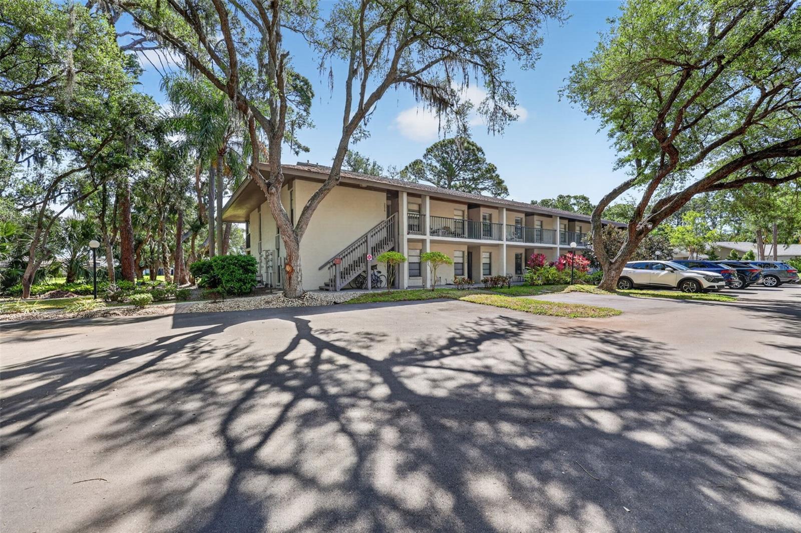 Best Kept Secret in Sarasota:) Great Turn-Key, quaint placement of this one bedroom, one bathroom condo in the Meadows. First floor walkout onto a lovely pathway of old Florida growth trees and just near the excellent pool. Front parking to the unit and covered entry to the front door. Complete tile floors, two window bedroom to fit side desk or sitting chair additional to the bed and dresser. Pocket door from master bedroom into the full bathroom with tiled shower/bath. Main living area has dining area, living room, wonderful kitchen with breakfast bar and island for meal preparation or serving. Four panel sliders looking out through the delightful screened lanai and onto a deep glorious nature view. Pool just outside the unit with a simple walk. Washer/Dryer is stacked and an outdoor closed storage can also be locked. Community is just down the street from the Meadows Country Club, golf and tennis. Additional Olympic pool and fitness center. Many trails of old growth for walking and biking. Excellent location near UTC Mall area, Lakewood Ranch to the east, downtown Sarasota to the SW, Anna Maria Island to the NW and dining/shopping/events abound being central. The coast offers some of the finest beaches on the Gulf Coast of Florida. A lovely unit for living or leasing seasonally.