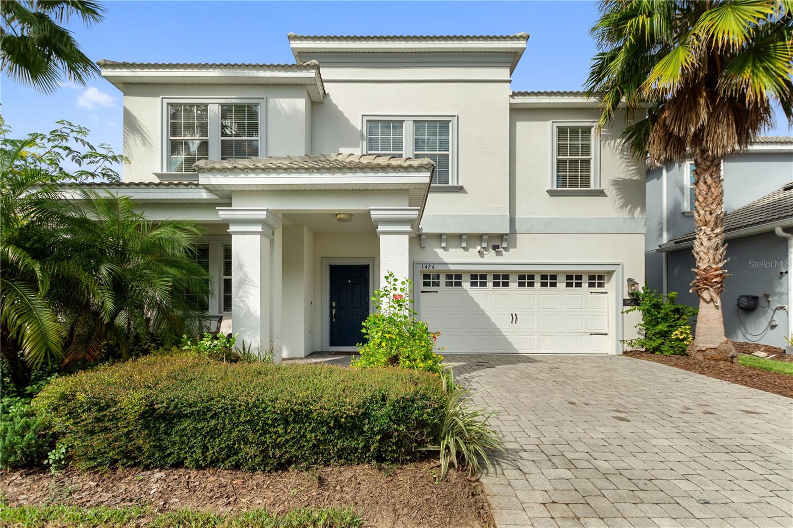 LIVE LIKE A CHAMPION! FULL GOLF & TENNIS MEMBERSHIP INCLUDED IN HOA! Beautifully maintained 4-bedroom home with an upstairs loft and downstairs den, offering 2.5 baths and located in the highly desirable Phase 2 of ChampionsGate Country Club. Situated on hole number 16 tee box, this home offers added space, privacy, and curb appeal—plus the unbeatable advantage of being just steps from The Plaza residents-only clubhouse. Enjoy Florida living year-round from your screened-in lanai, perfectly positioned to take in the vibrant community atmosphere—including fireworks and hot air balloons. Inside, the home features a butlers pantry with an open floor plan. Tile throughout the main areas and new carpet in the bedrooms, along with 42-inch cabinets, granite countertops and stainless steel appliances. Drive your golf cart throughout this guard-gated, resort-style community and take full advantage of unmatched amenities. The Oasis Club offers a 14,000+ sq ft clubhouse with a restaurant, movie theater, fitness center, game room, tiki bar, lazy river, and more. The Plaza—just steps away—features a residents-only restaurant, bar, fitness center, pickleball courts, and two pools, plus a $75/month food & beverage credit.HOA includes full golf and tennis membership, gated security, lawn care, cable, internet, and more. ChampionsGate Country Club delivers the ultimate Orlando lifestyle—minutes from world-class golf, dining, shopping, and theme parks.