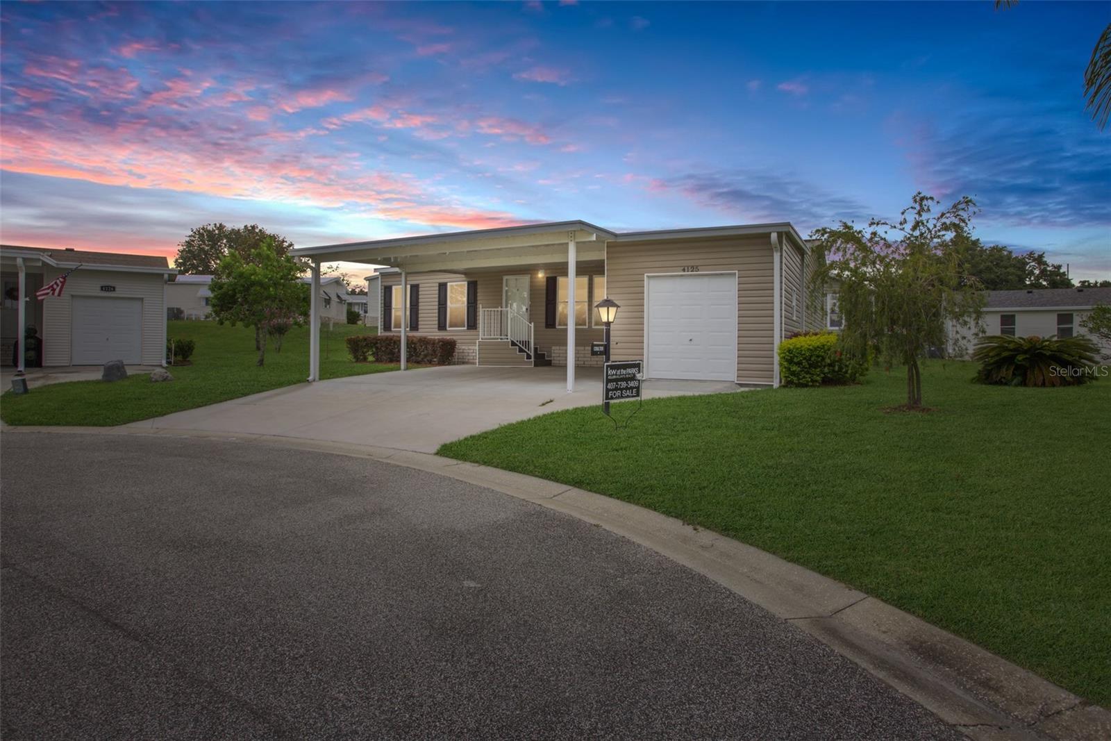 One of the Newer Homes in the Zellwood Station 55 Plus Community, Built 2021, this 3 bedroom 2 bath split plan is MOVE-IN Ready plus it's  partially furnished! Located on a quiet Cul-de-sac with close proximity to the Full Service Whistlestop Resturant/Bar, Pro Shop and one of the 4 available pools. New Laminate Flooring in most rooms, Open Floorplan. Kitchen w/Island, Living Room and Dining Room provide great entertaining space. Rear Screen porch for outdoor dining, Golf Cart Garage off the DOUBLE COVERED CARPORT. Inside Laundry Room is a plus. Must see to capture the welcoming feeling this home provides.  PET FRIENDLY. $415 HOA includes High-speed underground Fiber Optic Cable & Internet (2 boxes), Lawn Maintenance, Trash Pickup, 24/7 Manned Secuirty Gauarded Gate, 4 Pools, Pickelball, Tennis, Cornhole, Reduced Golf Greens Fees to our 72 Par Championship Golf Course, Use of activity buildings and more activities than you will possibly have time for. Schedule a Showing Today and experience "Where The Good Life Begins!"