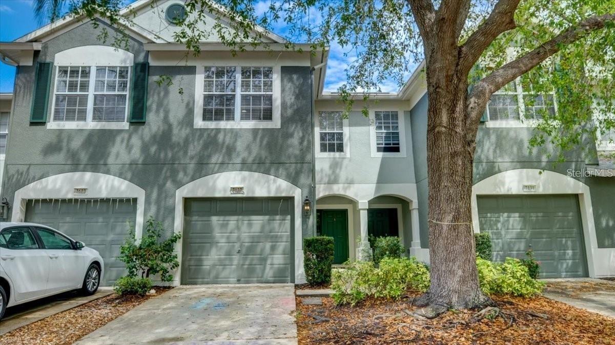 Spacious townhouse nestled in the highly sought-after gated community of Sabal Bay. Boasting three bedrooms, two and a half bathrooms, and a 1-car garage. As you step inside, the high ceilings and open floor plan create a welcoming atmosphere. The kitchen offers ample cabinet space and overlooks the living and dining room combo, perfect for entertaining guests. You can also enjoy some fresh air on the private screened-in back porch. Upstairs, you'll find all the bedrooms and full bathrooms, with a convenient half bathroom downstairs for guests. The master suite features a large walk-in closet and a bright master bathroom with dual sinks, a toilet closet, and a spacious garden tub. Sabal Bay is a gated community that offers a clubhouse, a large community pool, a covered cabana area, and a playground for your enjoyment. You'll love the south-facing backyard, and the close proximity to a variety of restaurants, shops, and amenities. Plus, water is included.