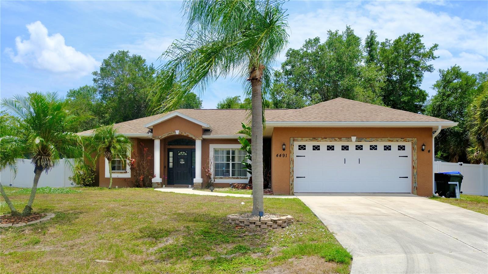 RARE — if not impossible to find — OVERSIZED CORNER-LOT HOME in the heart of North Port!

The split floor plan of this 3-bedroom, 2-bath home offers both open, functional shared living areas and quiet, comfortable spaces to retreat to. With the flexibility to raise a family, host guests, or create a dedicated home office, you’ll find boundless potential to make personalized updates, especially since the sellers have already completed the critical improvements for you: a new roof in 2023, A/C system in 2024, water heater in 2021, and a professional septic clean-out just two years ago.

The backyard is fully enclosed with vinyl fencing, offering privacy, mature palm and oak trees, and still plenty of room for your future pool. The spacious 2-car garage can also double as a hobby workshop.

AND — LOCATION, LOCATION, LOCATION! This home is directly across from Blue Ridge Park, a local hidden gem featuring an updated playground, scenic picnic areas, fishing docks, and a kayak launch into the Blue Ridge Waterway for a peaceful paddle to McKibben Park.

Located just minutes from both I-75 and US-41, this home provides convenient access to coastal beaches, the vibrant shopping, dining, and entertainment of Wellen Park, the historic Warm Mineral Springs, and the upcoming Sarasota Memorial Hospital.

This unique property offers exceptional access to outdoor recreation — WITHOUT HOA fees. Don’t miss the opportunity to make this North Port gem your own!
