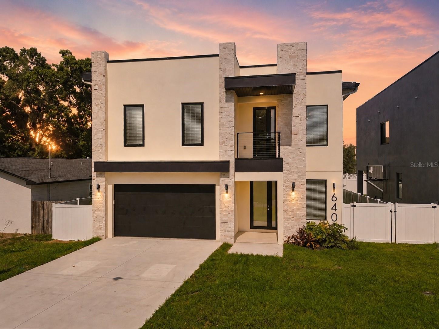 Virtually Staged. Warm contemporary design and timeless craftsmanship come together in this newly completed 4-bedroom, 4.5-bath residence offering 3,125 square feet of living space and over 4,000 square feet under roof in South Tampa’s rapidly evolving Sun Bay South neighborhood. Thoughtfully crafted by SALT & PEPPER CONSTRUCTION, this move-in-ready home blends clean architectural lines with warm natural finishes to create a sophisticated, inviting atmosphere. Located in Flood Zone X-500 and elevated above the base flood elevation, the home offers added peace of mind while just south of Gandy Boulevard with exceptional access to Downtown Tampa, Water Street, the Westshore Business District, Tampa International Airport, MacDill Air Force Base, waterfront parks, marinas, and many of Tampa’s favorite local restaurants. As new custom homes reshape the neighborhood, Sun Bay South continues to attract buyers seeking modern construction, convenience, and long-term value.

Designed for the way people live today, the open-concept floor plan is filled with abundant natural light and anchored by soaring 10-foot ceilings, light oak flooring, designer lighting, and curated finishes throughout. Every space balances clean contemporary aesthetics with warmth and functionality. At the heart of the home, the chef-inspired kitchen features custom slow-close cabinetry, quartz countertops, an oversized center island, premium stainless steel appliances, and a hidden walk-in pantry. Oversized sliding glass doors connect the spacious great room to the covered lanai, creating a seamless indoor-outdoor living experience with plumbing and gas already in place for a future outdoor kitchen.

The thoughtfully designed second floor offers both privacy and flexibility. The spacious primary suite serves as a true retreat with an oversized custom walk-in closet and a spa-inspired bathroom featuring dual vanities, a freestanding soaking tub, an oversized walk-in shower, and designer tile selections. Each secondary bedroom includes its own en-suite bathroom, while a generous bonus room offers flexibility as a media room, home office, fitness space, or playroom. A functional mudroom and drop zone, along with extensive storage throughout the home, make everyday living as practical as it is beautiful.

Built for lasting quality, the home features concrete block construction, impact-rated windows and doors, and construction that meets today’s hurricane standards. For even greater peace of mind, the residence is backed by a comprehensive builder warranty, including a 2-year systems warranty and a 10-year structural warranty through the nationally recognized 2-10 Home Buyers Warranty program. The fully fenced backyard provides a private outdoor setting that’s perfect for entertaining, relaxing, or simply enjoying Florida’s year-round lifestyle.

Thoughtfully designed with timeless finishes, functional living spaces, and enduring craftsmanship, this move-in-ready residence offers a rare opportunity to own beautifully executed new construction in one of South Tampa’s fastest-growing neighborhoods. Combining warm contemporary design, quality construction, and an exceptional location, this home delivers the perfect balance of style, comfort, and modern Florida living. A neighboring sister residence at 6401 S. Richard Avenue, featuring a similar floor plan and design aesthetic, is also available for private tour by appointment.