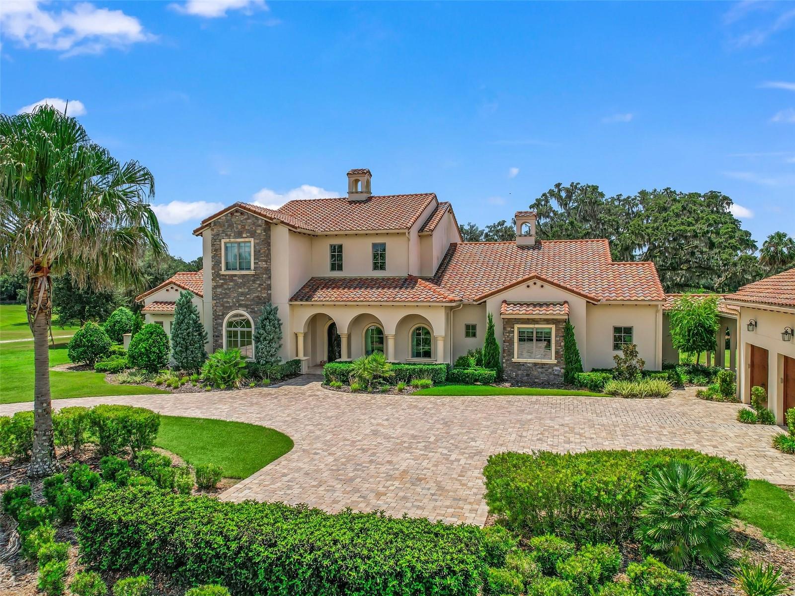 New Price now includes additional building lot and acreage for a total of 19.75 acres!!
Stunning Mediterranean style farm in the gated Equestrian Community of Bel Lago, just minutes from all of the major Equestrian venues and shopping. This spectacular property boasts a custom built 6200 sf, 2 story pool home with a casita and 4 stall center aisle barn. The enchanting home is offered completely furnished and turnkey with luxurious finishes and views of the lush grounds and landscaping. Enjoy the open, flowing floor plan complete with a formal living area overlooking the pool and outdoor living space, spacious gourmet, chef’s kitchen and enormous island overlooking the family room, perfect for entertaining guests. The luxurious master suite is located on the main floor with 2 large walk in closets and spa-like en suite and owner’s office space. The home also has another large living and entertainment space on the second floor with a large balcony overlooking the grounds, as well as a second office space to accompany the spacious guest rooms on the second floor. Enjoy the Florida lifestyle by the beautiful pool and outdoor living area complete with a summer kitchen and fireplace. Your guests will also fall in love with the private casita located by the pool and outdoor space. 
The farm is also a perfect getaway for your horses with lush paddocks, large, shady oaks trees and a beautifully appointed 4 stall center aisle barn. Additional acreage and adjacent lot (8-S) is also available for purchase if desired. Don’t miss this spectacular, one of a kind  property!