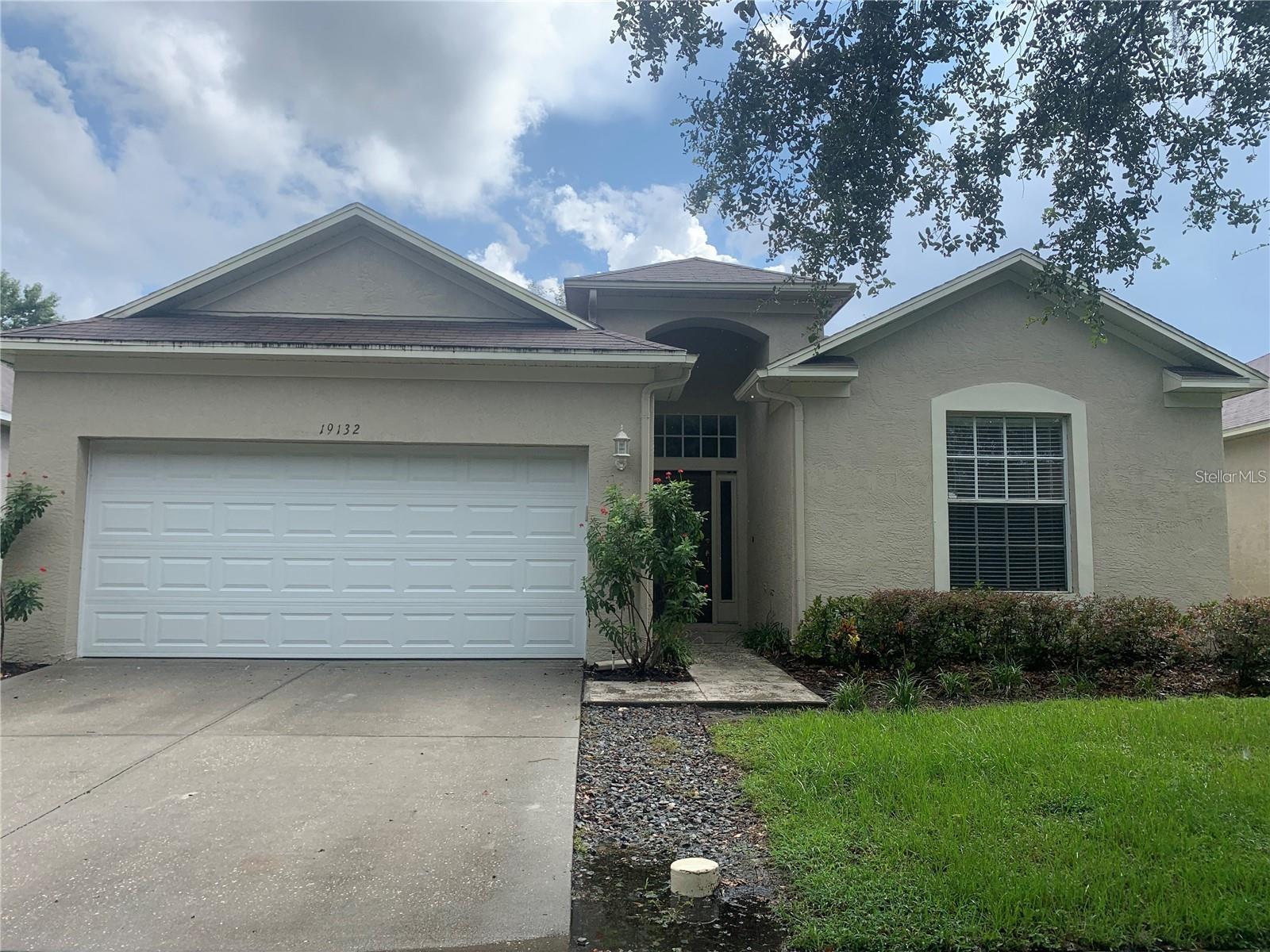 Welcome to this lovely single-family, fully detached home in the highly desirable community of West Meadow in the heart of New Tampa. Boasting an open, split floor plan concept, this well-maintained residence welcomes you with a bright foyer and durable laminated flooring that flows seamlessly throughout. The open kitchen features plenty of counter space, raised panel cabinetry, an eat-in breakfast area, and a convenient closet pantry. The primary suite showcases a large garden bathtub and plenty of storage space. Step outside through the rear doors to enjoy the massive backyard, perfect for outdoor entertaining or weekend relaxation.

Living in the West Meadows community grants you access to the resort-style amenities, including a neighborhood clubhouse, community fitness center, sports courts, and a pool complex. Nestled in a prime location just minutes from Bruce B. Downs Blvd, I-17, regional hospitals, and premier shopping and dining. New Roof replacement in 2021! (Photos shown were taken prior to the current tenancy. The property is currently tenant-occupied. Condition and appearance may differ from photos shown.)