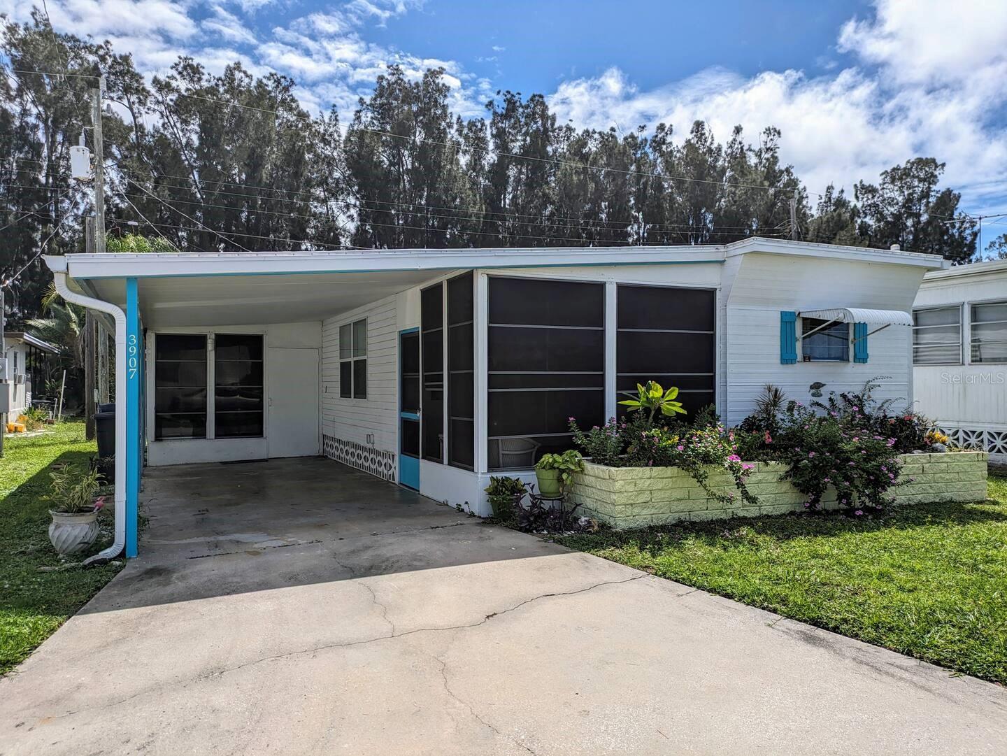 Newly remodeled 1 bed/ 1 bath mobile home with large enclosed back porch and additional front porch with attached carport. Cute neighborhood and very quiet street. Community has an adorable waterfront park on Palma Sola Bay for residents use- grilling, launching kayaks, fishing, or just enjoying the water and ocean life. Furniture is NOT included. Water, Sewer, Trash included. Lawn maintenance is included. 
First month and security deposit of $1000 required before move-in. 
1 year lease term. Electric, internet not included.