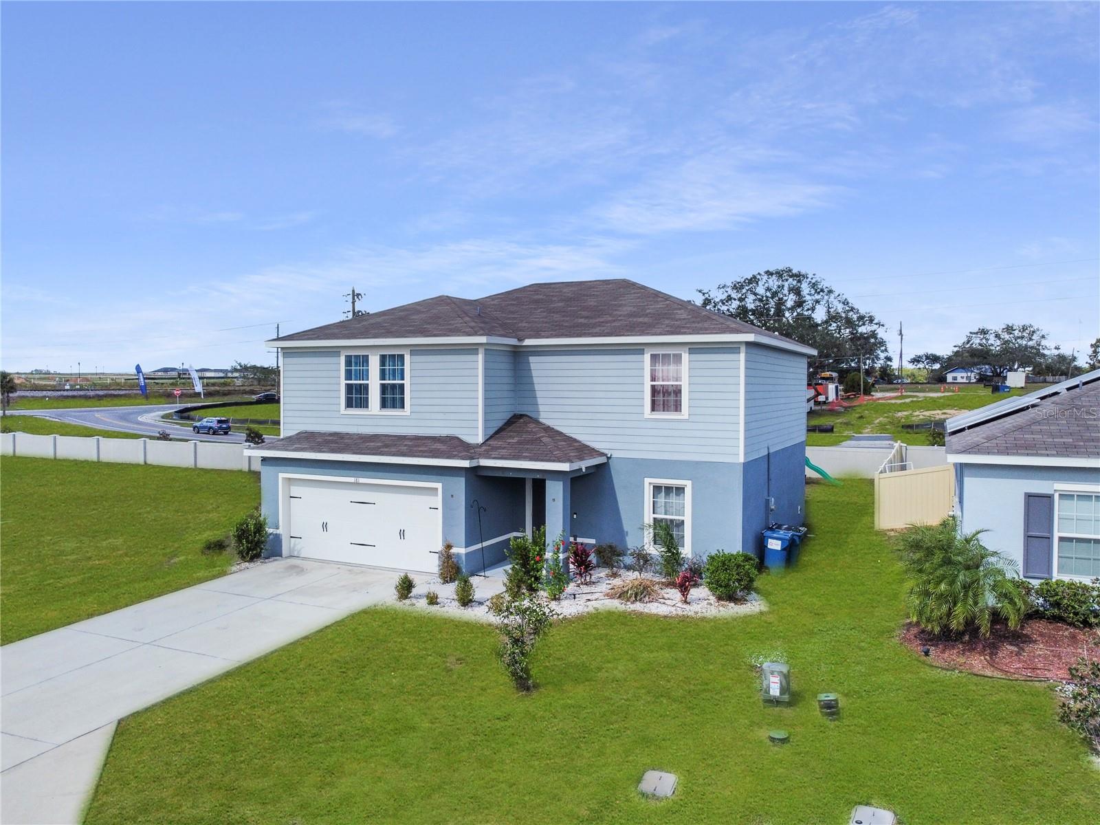 Welcome to this stunning 4-bedroom, 2.5-bathroom single-family home in the heart of Davenport, FL. As you step inside, you’re greeted by a bright and modern kitchen featuring stainless steel appliances, including a refrigerator, range, and microwave. The kitchen seamlessly flows into an open dining-living area combo, perfect for family gatherings and entertaining guests. Upstairs, you’ll find the spacious master bedroom, designed for ultimate comfort. The room is equipped with a ceiling fan for added comfort and boasts a large walk-in closet, offering ample storage space. The en-suite master bathroom is a true retreat, featuring dual vanity sinks and a clean, modern design. The additional three bedrooms are also located upstairs, providing convenience and privacy. Each room offers flexibility for use as a bedroom, guest room, or a home office. The second full bathroom includes a shower-tub combo, perfect for relaxing after a long day. The exterior of the home is equally impressive, with a spacious, fully fenced-in yard. It’s ideal for outdoor activities, gardening, or simply enjoying Florida’s beautiful weather in the privacy of your own backyard. Conveniently located near major roadways, shopping centers, and local attractions, this home offers both tranquility and accessibility. Don’t miss the opportunity to make this beautiful Davenport home your own! Contact us today! Home is unfurnished and will be rental ready from 7/7/26.