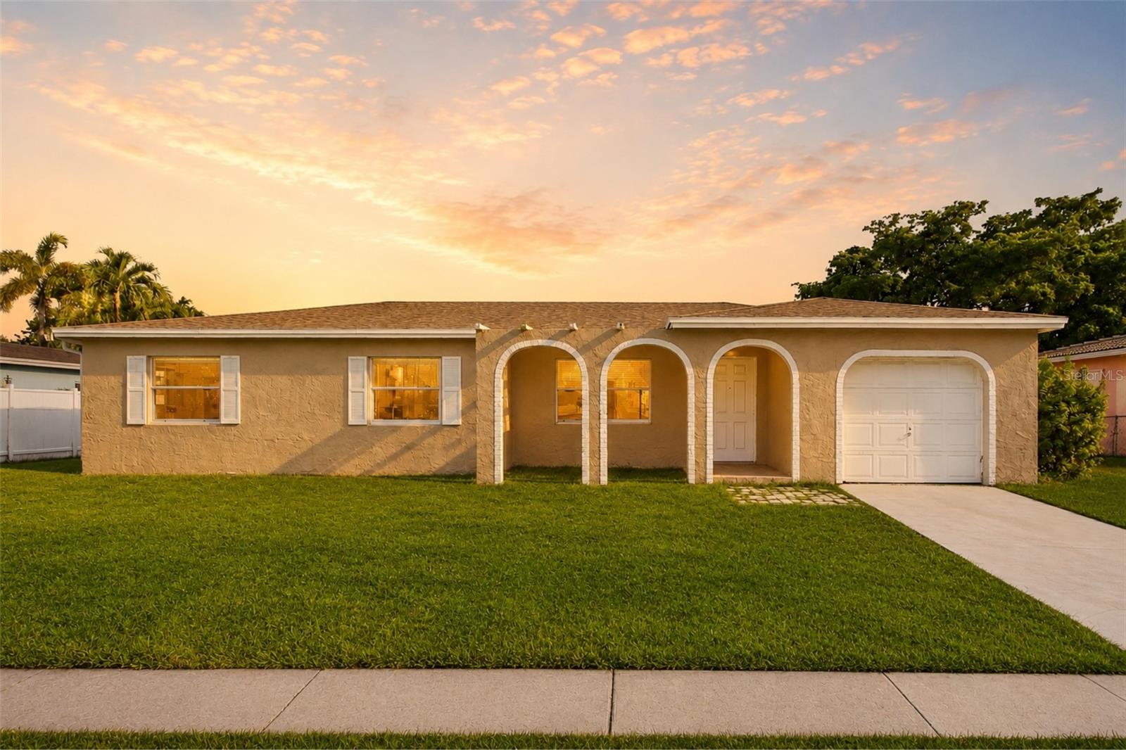 Virtually Staged. Priced to sell! This 4-bedroom, 2-bath home offers a fantastic opportunity to create the home of your dreams. Featuring mostly original finishes, AC was replaced in 2025, this property is ready for updates and personal touches. Enjoy a functional floor plan, spacious lot, and canal views in the established Holiday City at Boca Raton community. Conveniently located near shopping, dining, parks, and major roadways. Perfect for investors, renovators, or buyers looking to build equity. Don't miss this chance to unlock the potential of this well-located property!