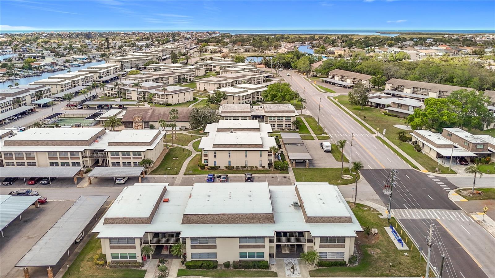 Welcome to 5132 Amulet Drive, Unit AA105, a beautifully updated first-floor condo located in the desirable Gulf Harbors community of New Port Richey. This 1-bedroom, 1-bath unit offers 728 square feet of easy, low-maintenance living with a functional layout and a bright, coastal feel. Inside, you’ll find a fully refreshed interior featuring brand new kitchen appliances, updated quartz countertops, and a clean, modern aesthetic throughout. The bathroom has been upgraded with a tub insert and new cabinetry, and the unit also features tile flooring, a spacious living/dining combo, and a versatile Florida room perfect for additional living space or a home office. A brand new A/C system adds peace of mind and energy efficiency.

Located in Gulf Harbors Condominiums, residents enjoy access to two community pools, a sauna, clubhouse, shuffleboard courts, and maintained grounds, all included in the monthly fee. Optional access to the private Gulf Harbors Beach Club offers a sandy beach on the Gulf with pavilions and stunning sunsets. The community is known for its laid-back coastal lifestyle and convenient location—walkable to a grocery store, bus stop, and nearby shopping and dining.