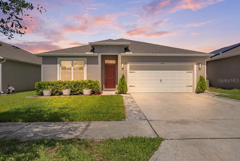 A rare find in the highly desirable Victoria Oaks community! This beautifully maintained Cali model, built in 2022, featuring a spectacular SCREENED ENCLOSED PRIVATE POOL that is heated and salt water making this the perfect outdoor entertainment area.
The open-concept floor plan seamlessly connects the living, dining, and kitchen spaces, creating a bright and inviting atmosphere ideal for everyday living and entertaining. The home features beautiful ceramic tile throughout the home. The kitchen is the heart of the home, showcasing granite countertops, stainless steel appliances, white shaker cabinetry, a spacious corner pantry, and a large center island perfect for meal preparation, casual dining, or gathering with family and friends.
The spacious primary suite overlooks the private pool area and features a  en-suite bathroom with dual granite vanities, a private water closet, an upgraded walk-in tiled shower, a custom walk-in closet, and an additional linen closet for extra storage.
Three additional bedrooms provide plenty of flexibility for family, guests, or a home office.
Step outside to your own backyard retreat. The screened lanai opens to a beautiful paver pool deck designed for relaxation and entertaining. A paver walkway leads to the pool area, while a separate patio provides the perfect setting for a fire pit and outdoor gatherings. The fully fenced backyard offers privacy with no rear neighbors directly behind you but offers plenty of space for pets, play, and outdoor activities.
Additional features include a smart home technology package, all kitchen appliances, blinds, upgraded ceiling fans, and designer light fixtures. Epoxy Garage Floor making maintenance effortless.
Victoria Oaks is a community surrounded by natural beauty and outstanding resort-style amenities. The HOA includes cable TV, high-speed internet, reclaimed water for irrigation, and access to three amenity centers featuring fitness facilities, resort-style pools, walking and biking trails, playgrounds, volleyball courts, and gathering spaces. The community clubhouse is available for special events and celebrations, making it easy to enjoy the Florida lifestyle year-round. Conveniently located near shopping, dining, medical facilities, and major highways, this exceptional home offers the best comfort, convenience, and community living.