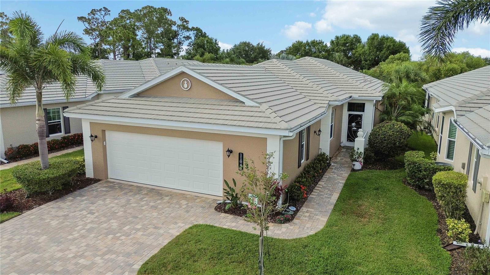 FEES INCLUDE INSURANCE ON THE STRUCTURE (DRYWALL OUT), WIND COVERAGE, ROOF RESERVES, EXTERIOR PAINTING, LAWN CARE, PEST CONTROL, TERMITE PREVENTION, TWO POOLS, A RESIDENT-RUN CLUBHOUSE, AND FULL COMMUNITY MANAGEMENT—EVERYTHING YOU NEED FOR A TRULY MAINTENANCE-FREE LIFESTYLE! PLUS NO CDD FEE! Nestled within the highly sought-after St. Andrews East at Plantation Golf & Country Club, this maintenance-free home with a private pool delivers the ultimate blend of luxury, comfort, and effortless Florida living.
At the heart of the home, the stunning gourmet kitchen showcases custom soft cream cabinetry, gleaming granite countertops, stainless steel appliances, a new oversized induction cooktop (2024), and a new refrigerator (2023). Designed with both functionality and style in mind, the space also features a spacious center island, breakfast bar, walk-in pantry, and a sunny breakfast nook framed by charming bay windows.
Sophisticated architectural details elevate the interior throughout, including crown molding, tray ceilings, plantation shutters, custom built-ins, and a seamless combination of tile flooring with engineered wood plank flooring in the bedrooms. The expansive great room feels bright and inviting, with sliding glass doors opening to a screened lanai where your own private pool and spa await. Surrounded by lush tropical landscaping, this outdoor retreat offers remarkable privacy and tranquility. The pool pump and controller were replaced in 2024, and all pool equipment has been meticulously maintained for worry-free enjoyment year-round.
The spacious primary suite is designed as a relaxing sanctuary, featuring tray ceilings, dual walk-in closets, dual vanities, and a luxurious Roman shower. A thoughtfully designed split-bedroom floor plan provides ideal guest privacy. One guest suite includes a walk-in closet and ensuite bath with convenient jack-and-jill access to an additional half bath, while the third bedroom currently serves as a den/office.
Built for both comfort and peace of mind, the home is equipped with impact windows and electric roll-down shutters on the lanai, securing the covered outdoor living area and sliding doors within minutes during inclement weather. Additional storage is plentiful with generous interior closets and an oversized garage. Mechanical updates include a new HVAC compressor and coil installed in 2024.
Condominium ownership allows for truly carefree living, making this property ideal for seasonal residents, frequent travelers, or anyone seeking a low-maintenance lifestyle. Association fees include exterior insurance from the drywall out including wind coverage, roof reserves, exterior painting, pressure washing, grounds and irrigation maintenance, landscaping, pest and termite control, internet service, and more. There is NO CDD fee!!!
Residents enjoy access to an active resident-run clubhouse and two sparkling community pools. Optional membership to Plantation Golf & Country Club offers an exceptional resort-style experience with two 18-hole championship golf courses, 13 Har-Tru tennis courts, six pickleball courts, Bocce Ball, a fitness center, Jr. Olympic-sized pool, fine dining, and an exciting calendar of social events and activities.
Perfectly positioned just minutes from Gulf beaches, shopping, dining, Wellen Park Downtown, and the Atlanta Braves Spring Training Stadium, with convenient access to I-75, this exceptional residence offers upscale Florida living at its finest.