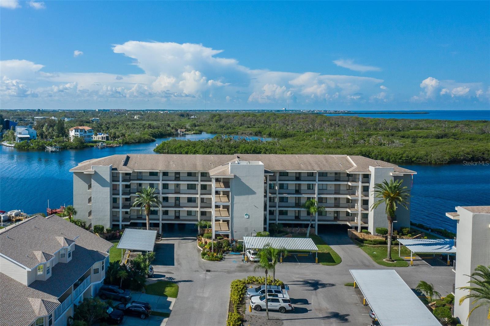 Sand Pebble Condo with a Million-Dollar View ???

Welcome to Sand Pebble, where every room in this beautifully remodeled condo offers either a waterfront or water-view experience. The owner spared no expense in creating a home that perfectly blends comfort, style, and coastal living. Inside, you’ll find two spacious bedrooms and two updated baths. The modern kitchen opens seamlessly to the dining and living areas, creating the perfect space for entertaining or relaxing. A porch with sliding hurricane-rated glass windows adds extra square footage and year-round enjoyment of the stunning views.
Additional perks include garage parking, extra storage, and the option to purchase a boat dock or RV storage.  This unit owner has a large dock available for purchase also for $35,000 if interested.
Sand Pebble residents enjoy resort-style amenities such as two swimming pools, a clubhouse, fitness room, tennis courts, bocce ball, and a private boat launch. This gated community also offers 24/7 security and safe, scenic walking paths surrounded by multi-million-dollar homes.
Don’t miss your chance to live the Sand Pebble lifestyle—schedule your private showing today! ???