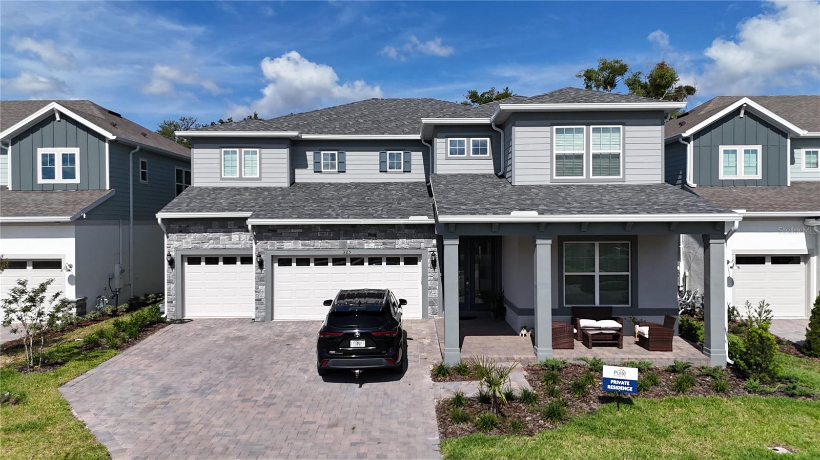 Welcome to Winter Grove in the charming city of Winter Garden. Ideally located just 1.2 miles from Winter Garden Village and approximately 2.8 miles from Historic Downtown Winter Garden, this intimate gated community offers the perfect blend of luxury, convenience, and privacy. Featuring spacious homesites and no CDD, residents enjoy easy access to premier shopping, dining, entertainment, and everything that makes this one of Central Florida’s most sought-after locations.
Introducing the stunning Roseland model, a beautifully designed 5-bedroom, 5-bathroom residence with a 3-car garage, offering an exceptional balance of elegance, functionality, and thoughtfully curated finishes throughout.
As you step through the impressive double glass entry doors, you are welcomed by a dramatic two-story foyer that immediately creates a grand first impression. Just off the entrance, an enclosed flex room provides endless possibilities—ideal as a home office, fitness room or additional living space—while the formal dining room creates the perfect setting for entertaining.
Continuing through the home, a striking staircase featuring engineered hardwood plank treads and wrought iron balusters enhances the sophisticated design. Tucked beneath the staircase is a wine lover’s dream: a stylish wine cave complete with built-in cabinetry, quartz countertops, and designer tile backsplash.
At the heart of the home, the open-concept kitchen is designed to impress, featuring built-in KitchenAid stainless steel appliances, including a gas-cooktop, oven, and beverage cooler. Beautiful two-tone soft-close cabinetry is paired with elegant quartz countertops, creating a timeless and refined aesthetic, while a spacious walk-in pantry provides abundant storage.
The seamless flow between the kitchen, café, and gathering room creates an inviting and light-filled space, ideal for both everyday living and entertaining. Sliding doors lead to the covered lanai, which has already been pre-plumbed and pre-wired for a future outdoor kitchen, including electric, water, sewer, and natural gas connections—allowing the future owner to easily create their dream outdoor living space.
Also located on the first floor is a spacious Multi-Gen Suite, perfect for guests or multigenerational living, complete with a walk-in closet and private bathroom.
Upstairs, the luxurious owner’s suite occupies its own private wing, creating a peaceful retreat. An additional sitting area provides the perfect place to unwind or enjoy quiet moments. The spa-inspired owner’s bath showcases a freestanding soaking tub, oversized frameless glass shower and generous dual walk-in closets.
The second floor also features additional well-appointed bedrooms, including two connected by a Jack-and-Jill bathroom and another with its own private en-suite bath, offering both comfort and privacy for family and guests. The upstairs laundry room, complete with cabinetry and a utility sink with quartz finishes, adds everyday convenience.
Residents of Winter Grove also enjoy access to community amenities including a beautiful pond with walking trails.
With an intelligently designed floor plan, carefully selected finishes, and a highly desirable location, this exceptional home offers the perfect blend of luxury, comfort, and lifestyle.
Schedule your private tour today and experience this extraordinary home has to offer.