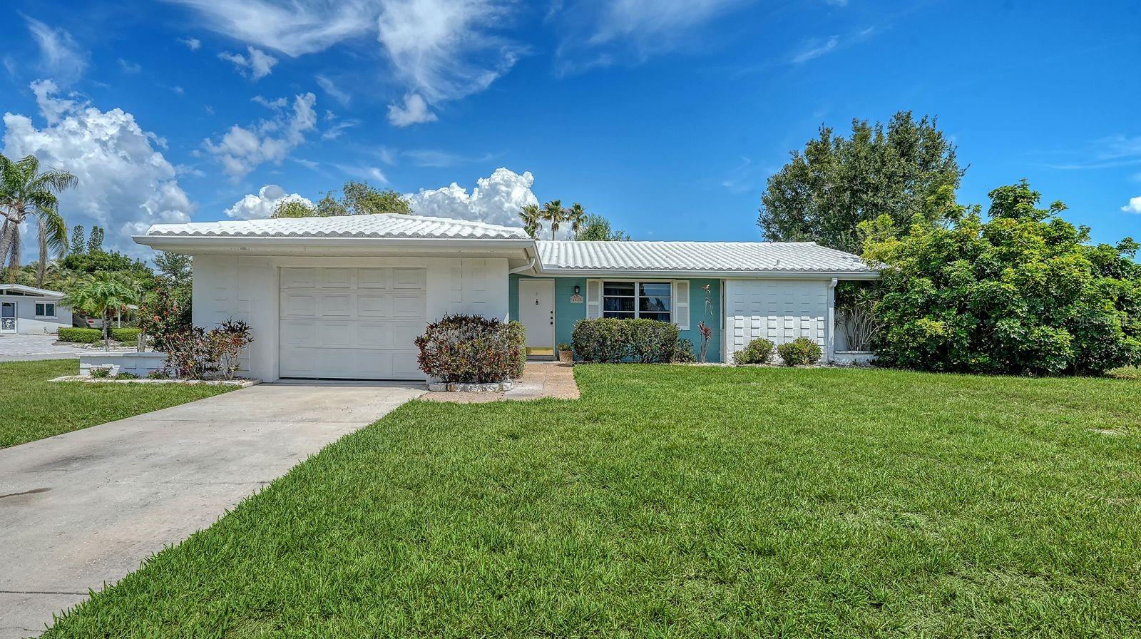 One or more photo(s) has been virtually staged. Lowest priced (active) home in Gulf Gate and the seller will provide a credit for a shingle roof (for the main roof) at closing or replace the main roof with a shingle roof prior to closing. Look no further for this "priced to sell" home that is available for immediate occupancy! Split Plan, "Built by Richmond", Air conditioner (York 14 Seer 2.5 ton Package unit w/8kw heat kit) replaced 2019 & the plumbing replaced overhead 1995. The location is on a quiet cul-de-sac and is ideal with little traffic. Primary Bedroom Suite offers a bay window and is 20 x 11 with a walk-in-closet. Both bathrooms are large. Wonderful neighbors and the enforced deed restricted community keeps the homes nice. Membership is optional at $75 a year but the deed restrictions must be followed. Sidewalks line the neighborhood and Gulf Gate is a community of good neighbors! World renowned Siesta Key beaches are within 10 minutes and cultural downtown Sarasota is only 20 minutes away and it offers fine dining, entertainment, shopping, movie theaters, opera, Selby Gardens and more! Make this Gulf Gate Gem yours today!