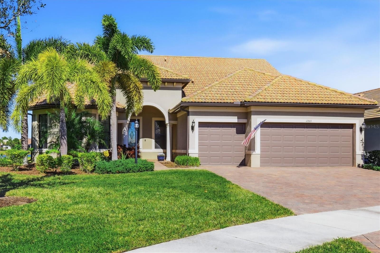 THIS VIEW IS AMAZING! COME SEE !!! Welcome to your beautiful new home in Del Webb At Lakewood Ranch, where luxury meets tranquility. Perfectly situated on a quiet cul-de-sac with stunning lakefront views, this exceptional Estate offers privacy, elegance, and the ultimate Florida lifestyle. Enjoy outdoor living at its finest with a sparkling heated saltwater pool and spa, along with a brand-new outdoor gourmet kitchen—ideal for entertaining.
Inside, the Chef’s kitchen impresses with built-in KitchenAid appliances, a custom-designed pantry and beverage center complete with wine rack and beverage cooler, and an expansive 10’ x 4’ stone-top island. The home is thoughtfully designed with four bedrooms, office, 2nd level bonus room, four full bathrooms, dual-zone air conditioning, and hurricane-impact windows and doors throughout. A whole-house Generac generator provides peace of mind year-round.
The extended garage includes a four-foot extension and a custom Polyaspartic epoxy floor, comfortably accommodating three vehicles.
Located in a 55+ maintenance-free community, Del Webb offers an unmatched lifestyle with a full-time Lifestyle Director and world-class amenities, including dining at the Lakehouse Clubhouse, resort-style pool, state-of-the-art fitness center, six tennis courts, eight pickleball courts, bocce ball courts, art center, barbecue area, barefoot bar, movie nights, dancing, dog park, fire pit, billiard room, internet café, and an on-site lakefront restaurant.
This is Florida living at its finest. Don’t miss your opportunity to own this incredible home. Some furnishings may be available!