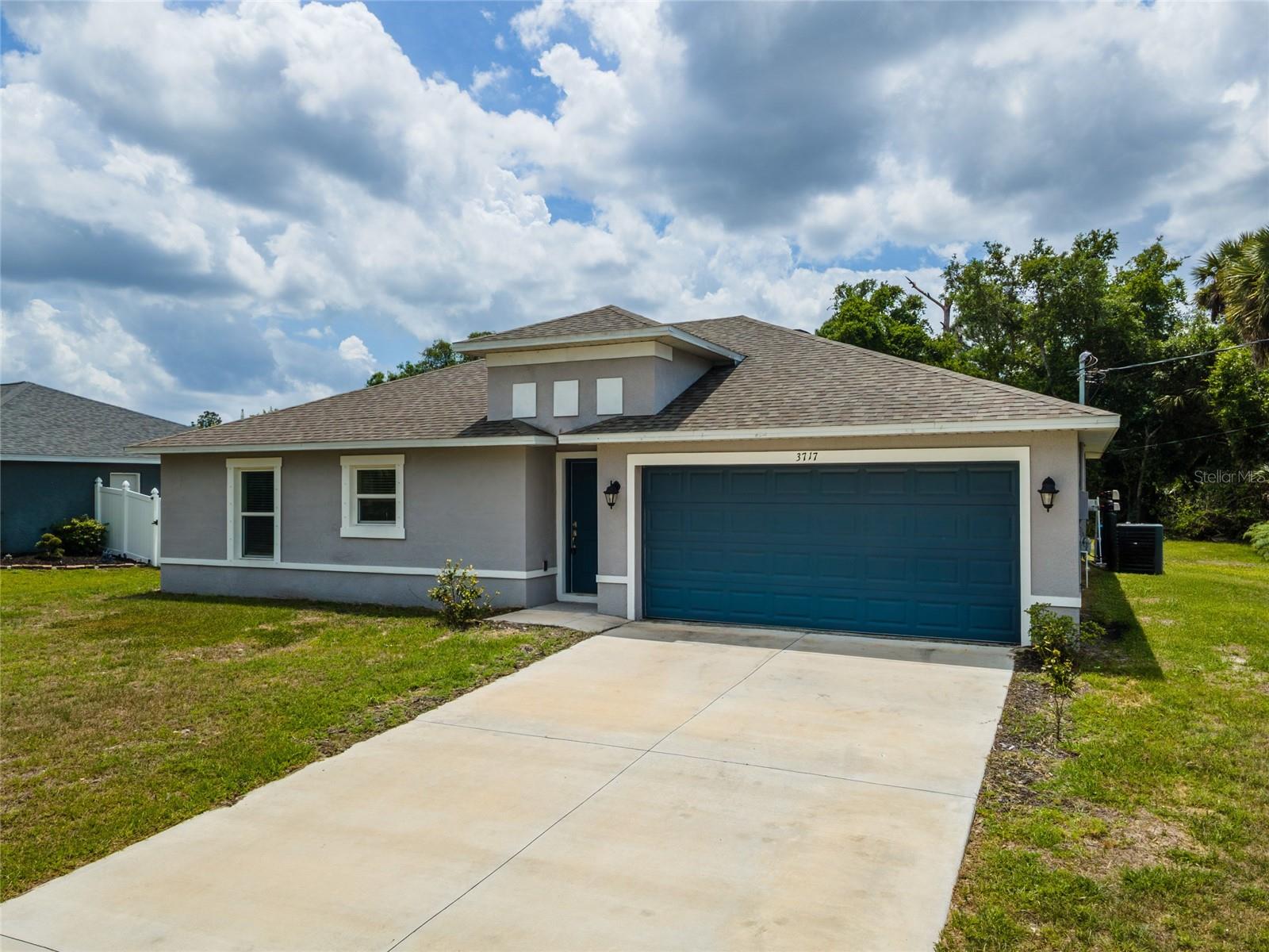 Welcome to this like-new 3 bedroom, 2 bath home in North Port, FL that feels fresh and ready for you to move right in. This home has only been lived in for one year as a rental, so it still has that clean and modern feel buyers love. As you walk in, you will notice the bright and open layout that makes it easy to enjoy time with family or friends. The kitchen offers plenty of space to cook and gather, while the living area feels warm and inviting. Each bedroom is cozy and gives you a quiet place to rest, and the main bedroom includes its own private bath for extra comfort. Outside, there is room to relax, play, or enjoy the sunny Florida weather. With newer features, you can enjoy less upkeep and more peace of mind. Located in the growing city of North Port, you are close to parks, shopping, dining, and just a short drive to beautiful Gulf beaches. This home is a great fit for first-time buyers, seasonal living, or anyone looking for a smart investment. Move-in ready and easy to love, this home is one you do not want to miss.