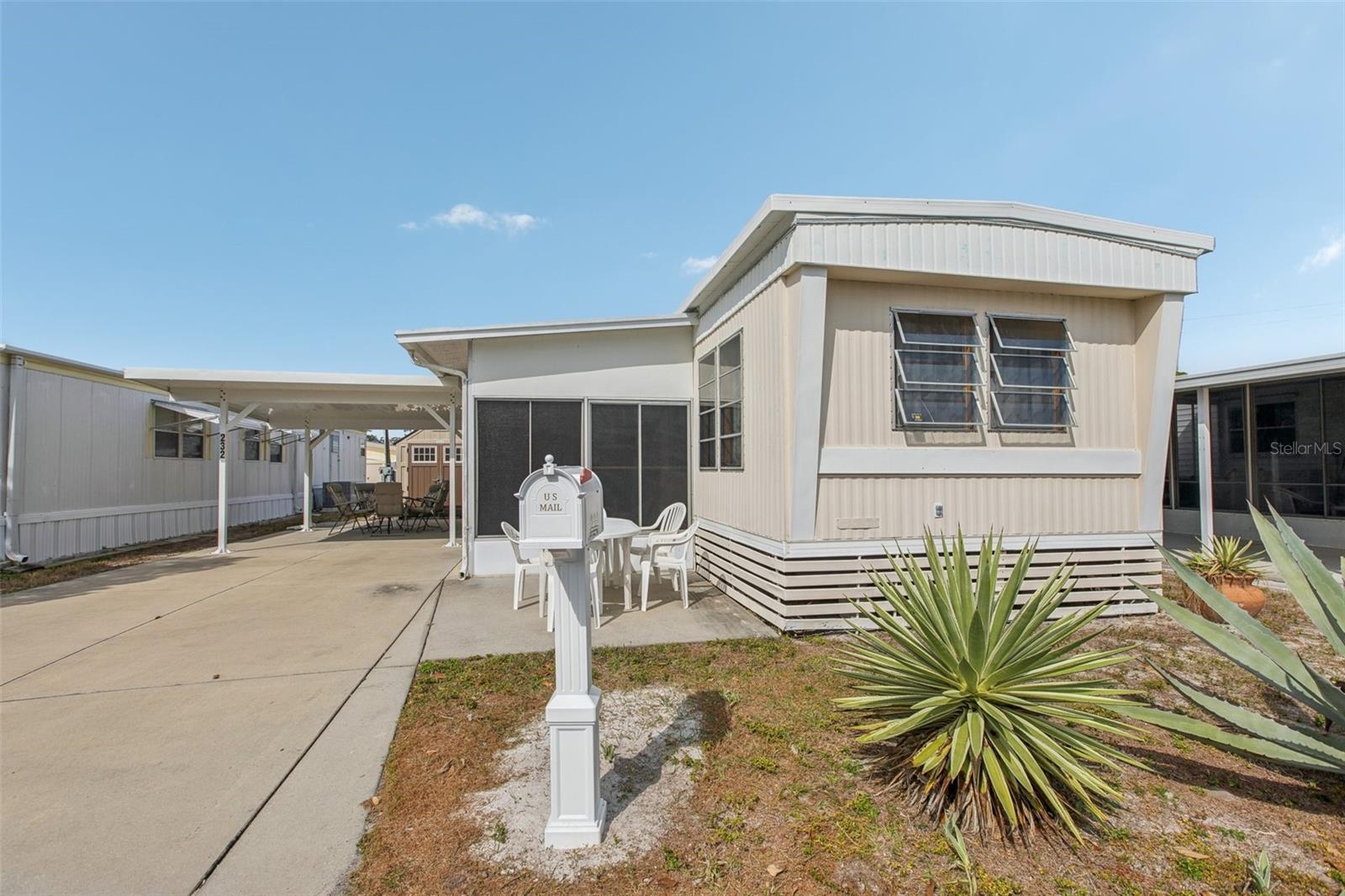 Bring your best offer!!!.Location is the best!!This is a cozy and adorable home, with lots of space. The front lawn has a sitting area with table and chairs, there is a spacious shed at the end of the driveway for storing ease. The lanai has plenty of room for a seating area and then enter the home to a lovely living room/dining room combination, a galley kitchen, and adequate cabinet space. down the hall is the bathroom and a good size bedroom with a large wall closet. Just bring your personal belongings, because the home is fully furnished. Whether you live in Florida full time, or just a few months a year, you will enjoy the pool, clubhouse and shuffleboard or just taking a stroll around the park.