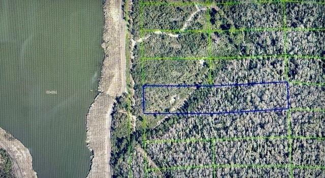 Large 2.39 acre parcel of unimproved land offered BELOW appraised price (appraisal available) for a quick sale. This property is located on Dill Road (not too far off of East Colonial Drive) and is zoned A-2 for future development.